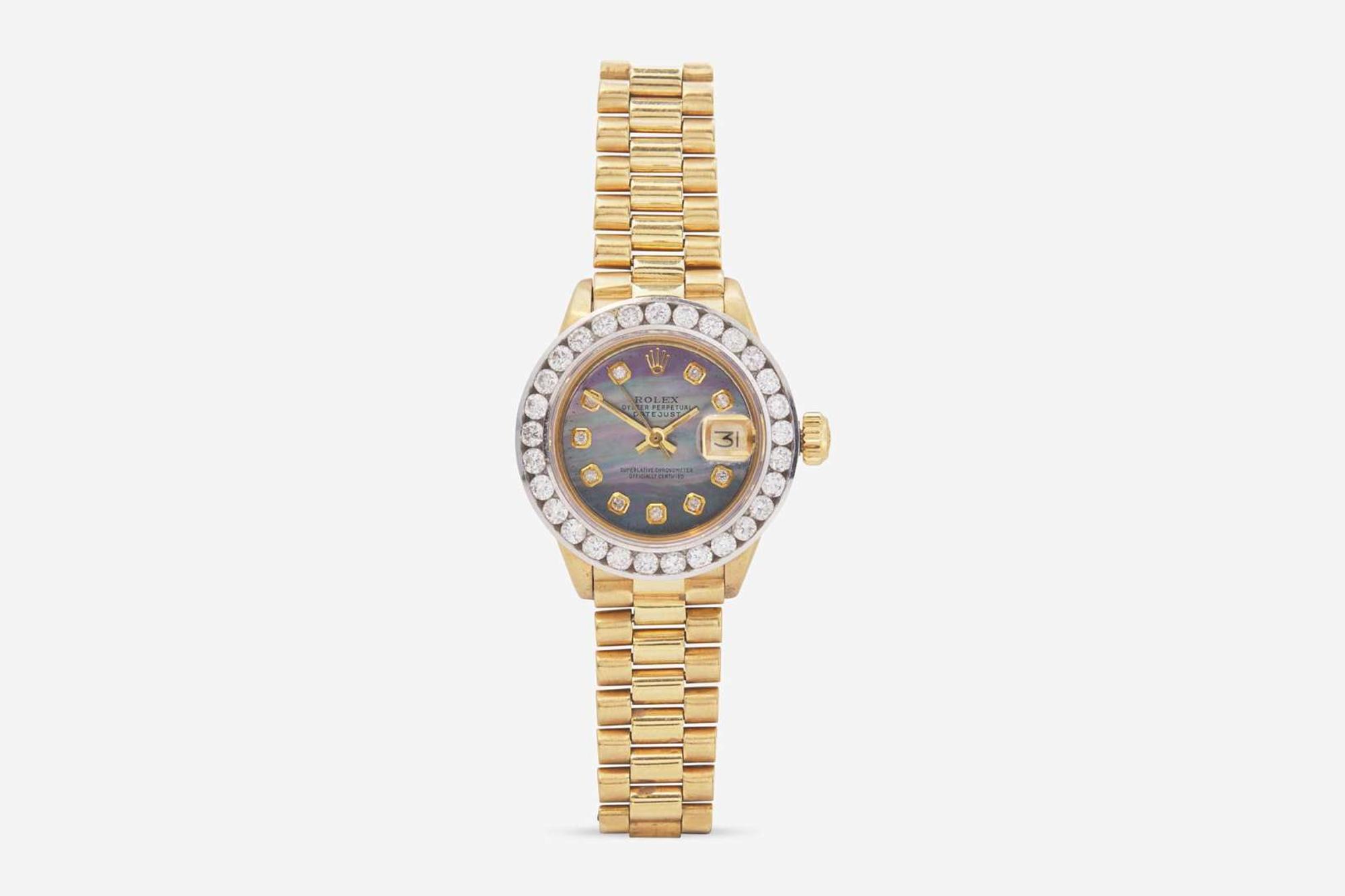 A Ladies 18K Yellow Gold, Mother-of Pearl, and Diamond Presidential Rolex