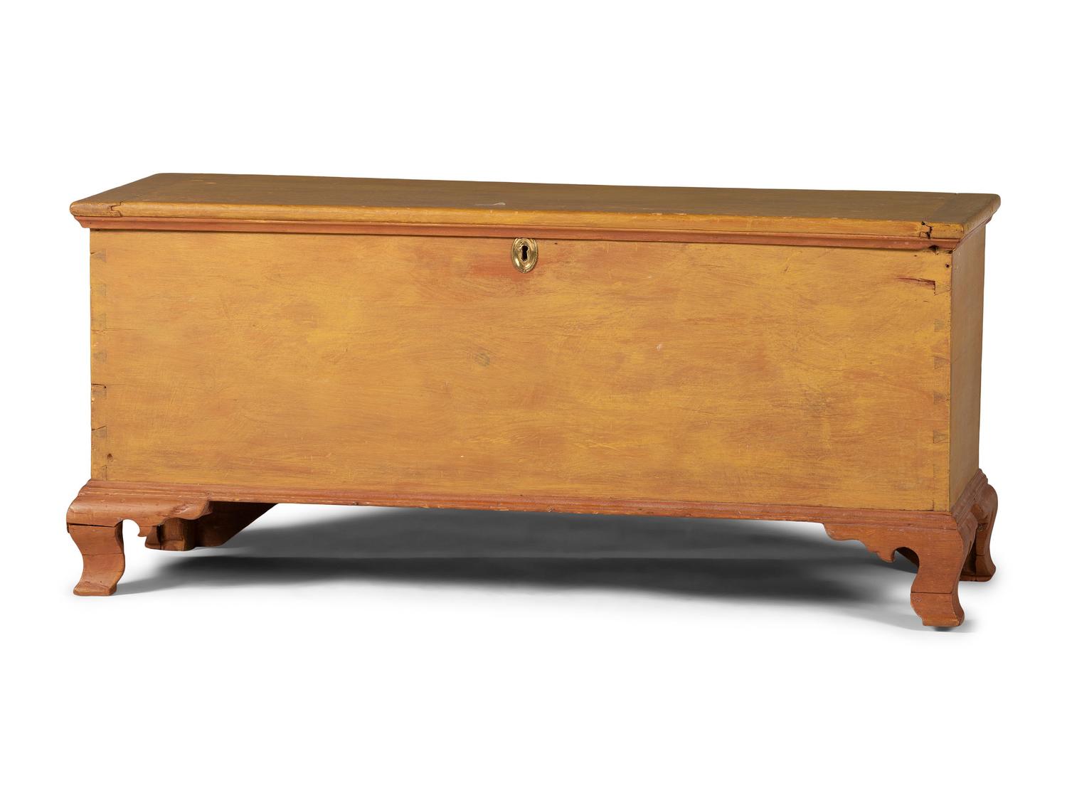 A Chippendale Yellow and Red Painted Pine Blanket Chest
