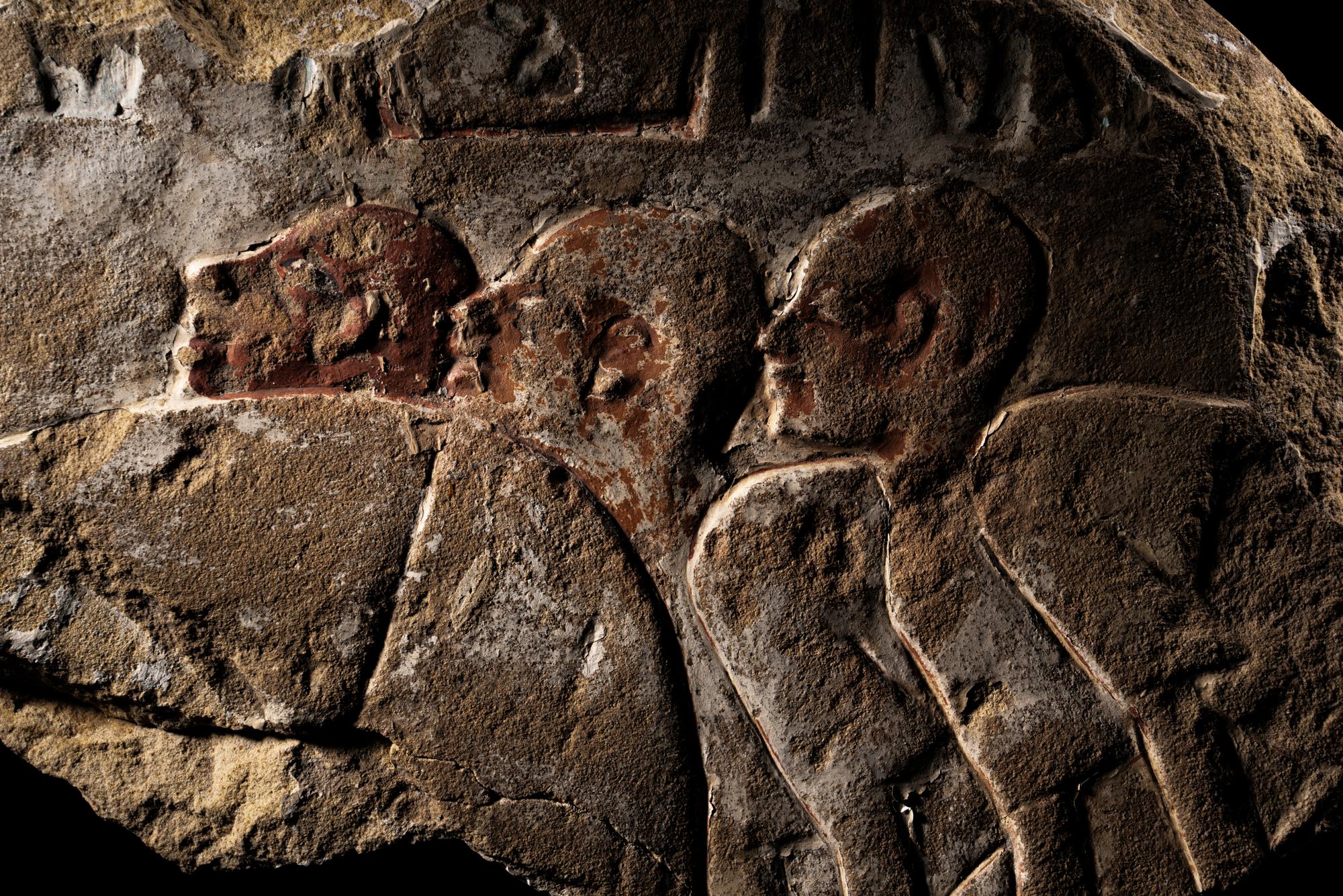 An Egyptian Painted Sandstone Relief Fragment
