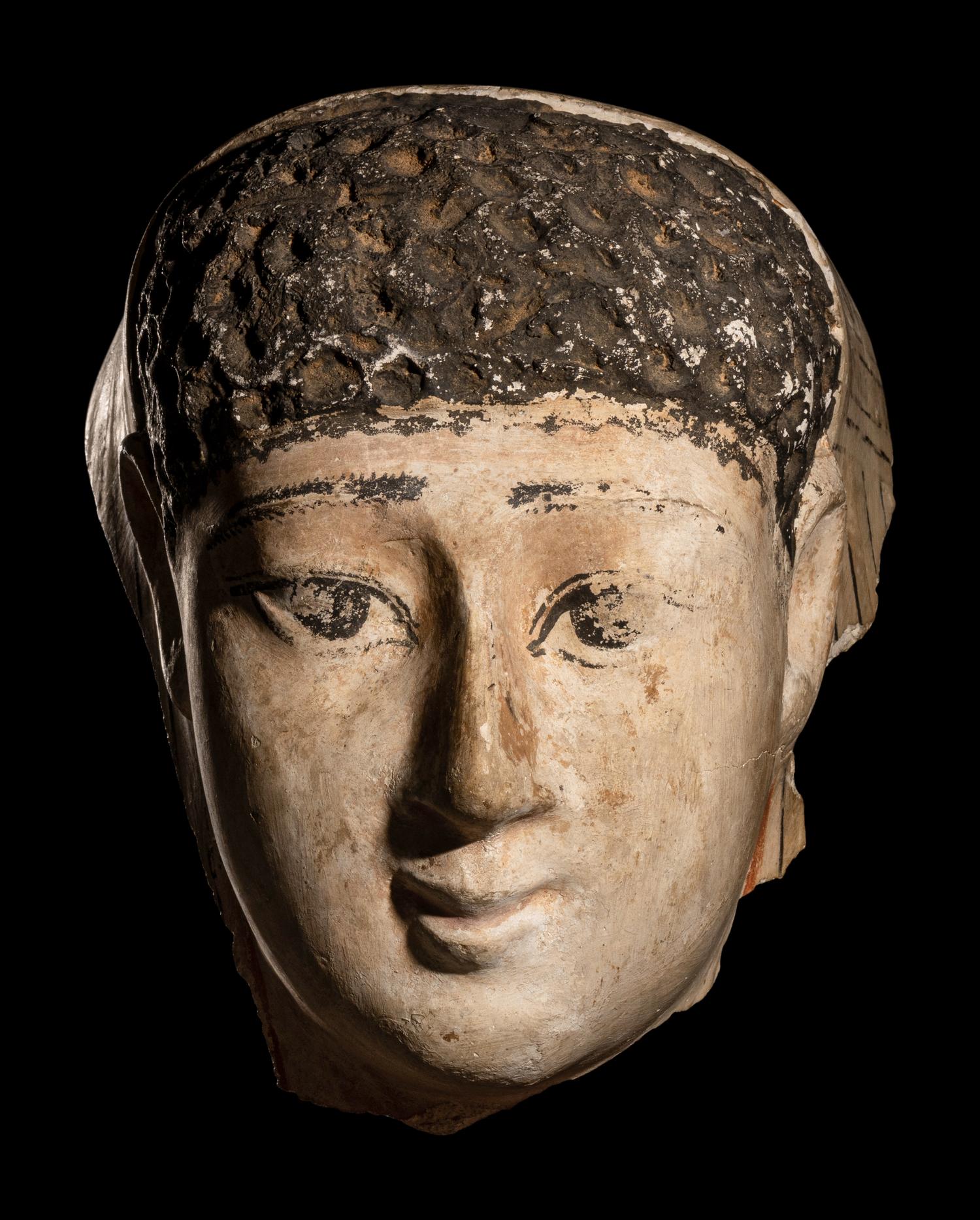 An Egyptian Cartonnage Mummy Mask