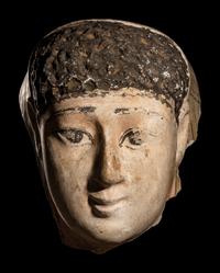 An Egyptian Cartonnage Mummy Mask