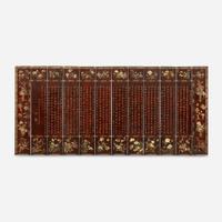 A Chinese carved twelve-panel "Coromandel" folding screen 17th/18th Century