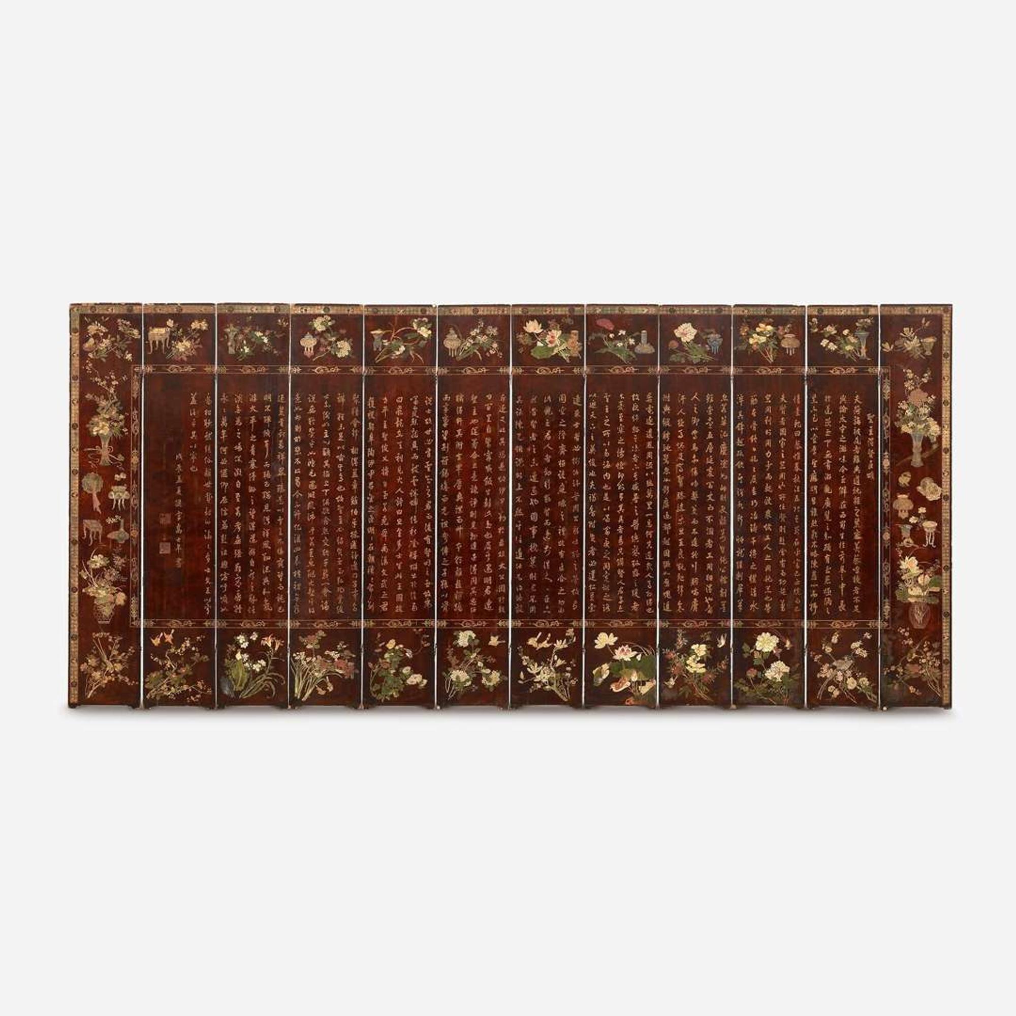 A Chinese carved twelve-panel "Coromandel" folding screen 17th/18th Century