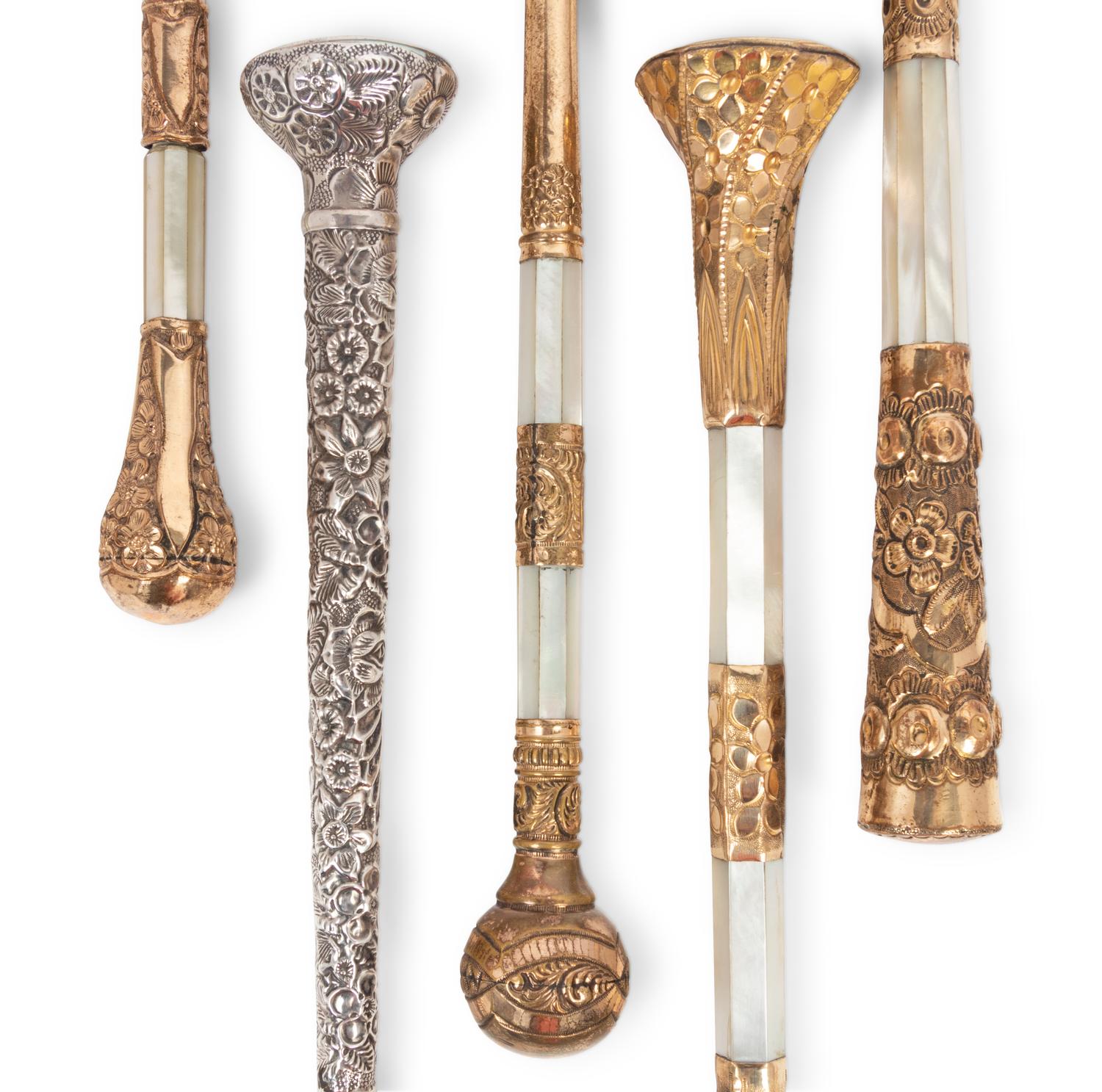 A Group of Five Victorian Parasol Handles Converted to Magnifying Glasses