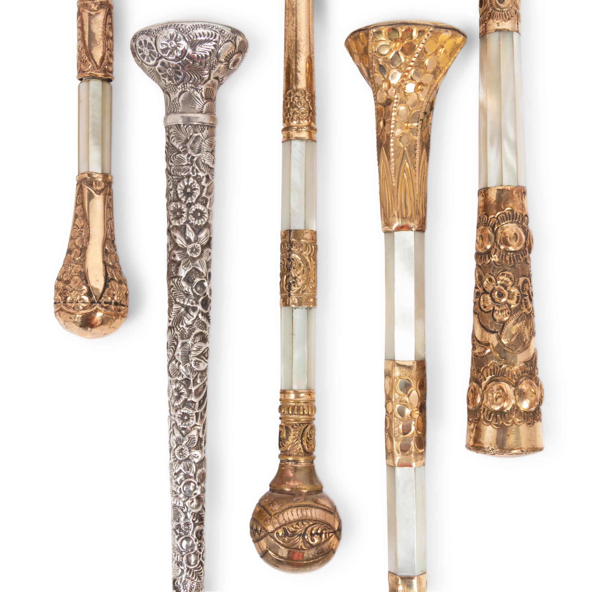 A Group of Five Victorian Parasol Handles Converted to Magnifying Glasses