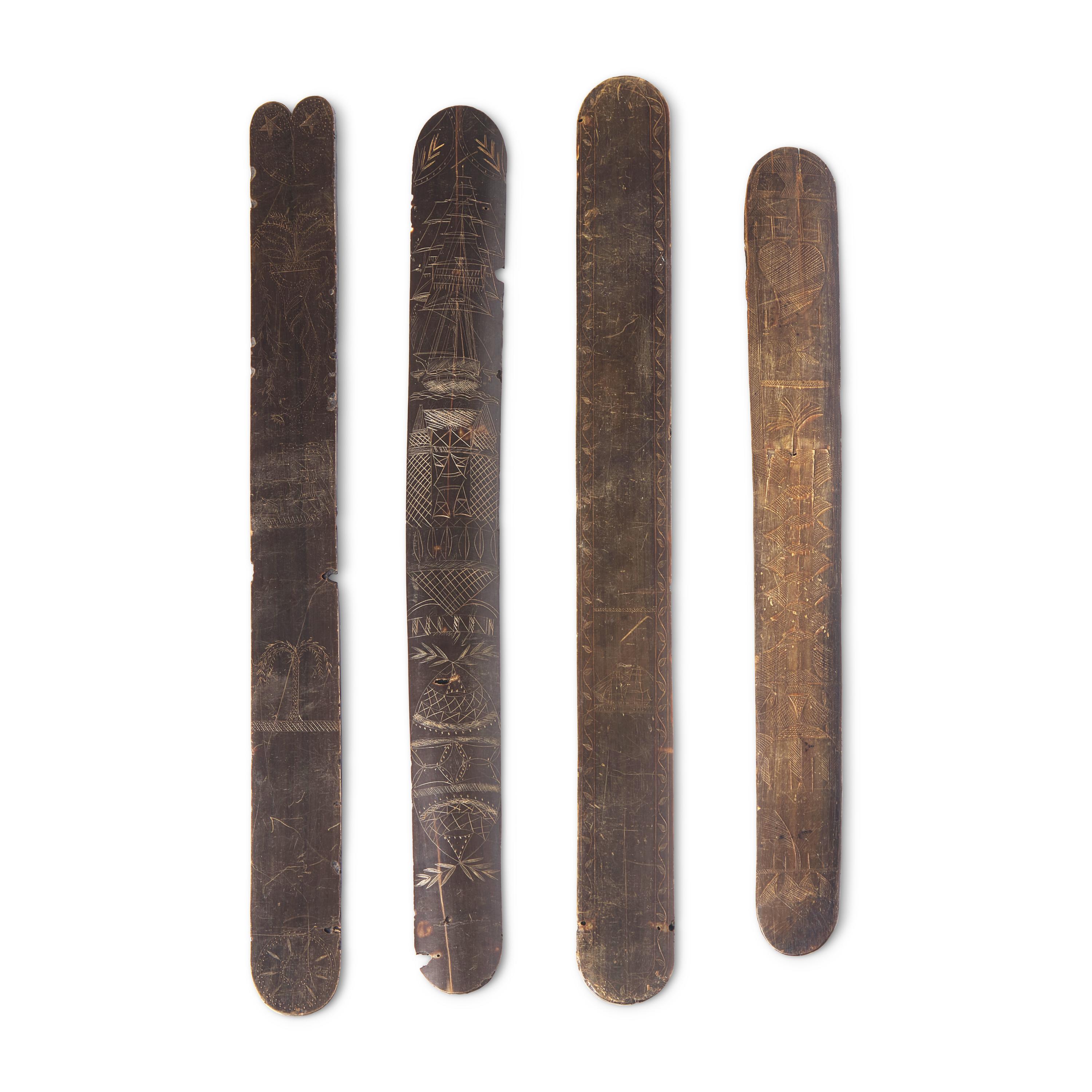 A Group of Four Sailor-Carved Busks