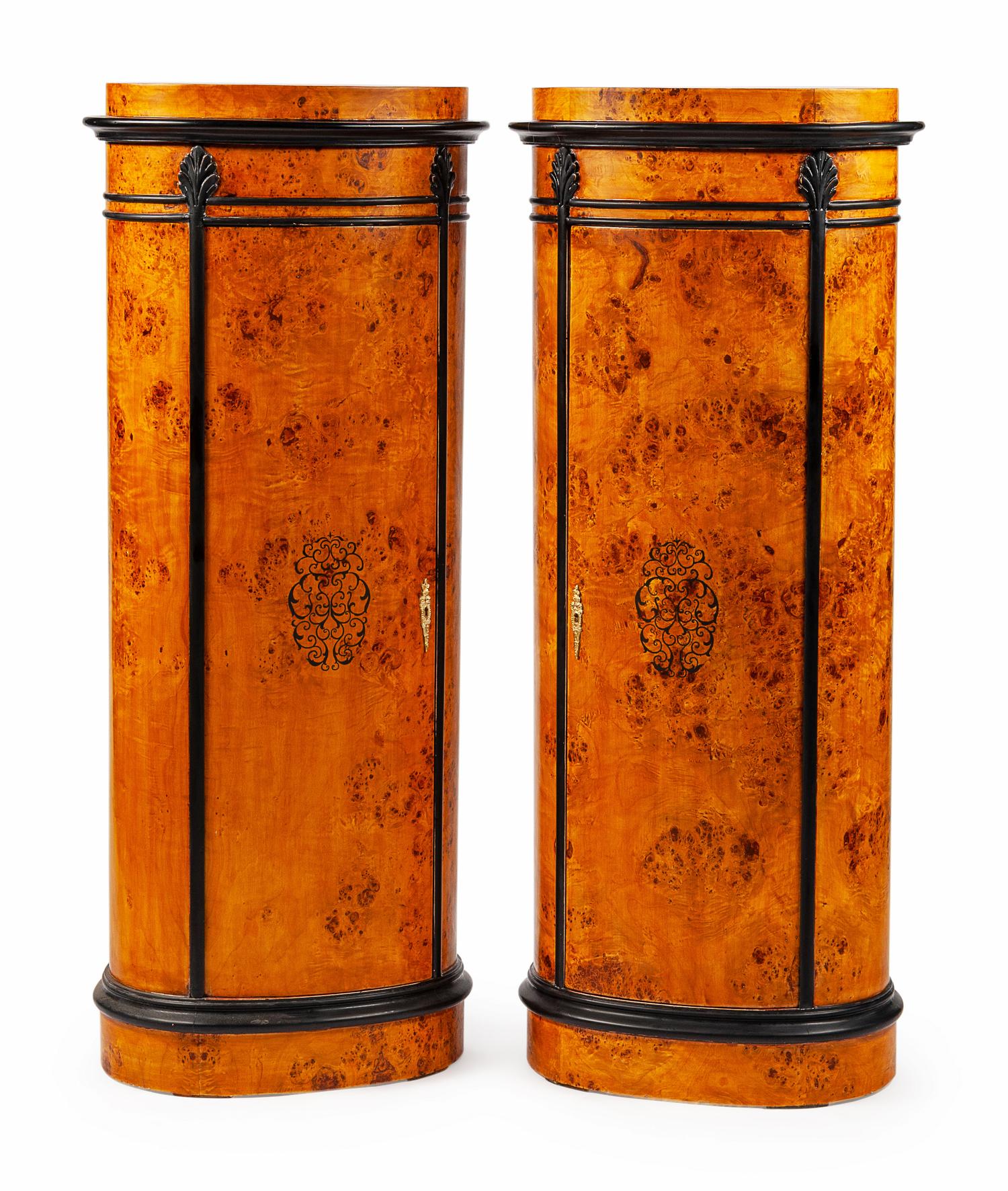 A Pair of Danish Parcel Ebonized Cabinets