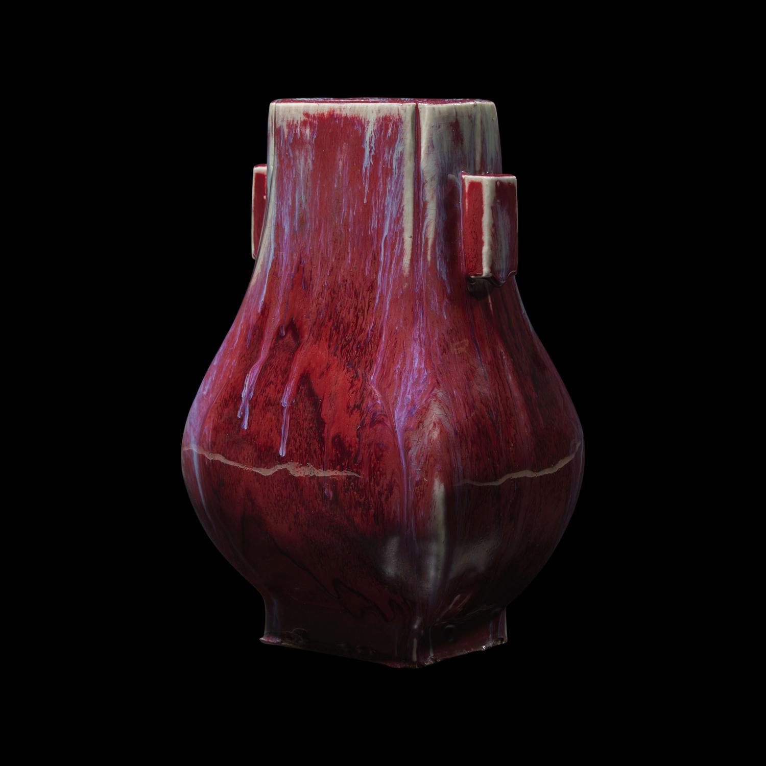 A Chinese Flambé-Glazed Vase, Fanghu , Six Character incised Xuantong Mark and Possibly of the Period 清宣統六字款 窯變釉雙耳方壺