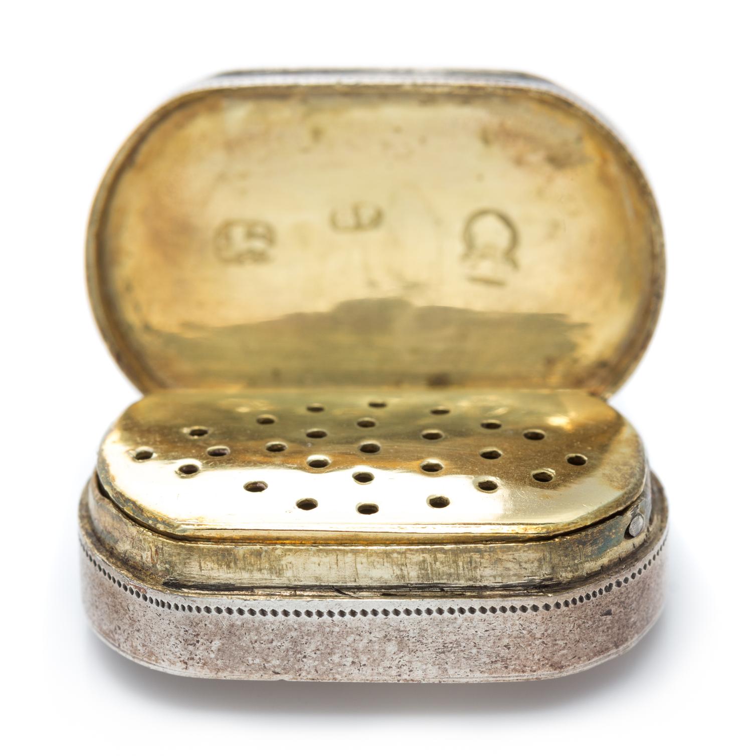 A George III Silver Vinaigrette, Samuel Pemberton, Birmingham, 1775, of oval form with a floral decorated border along lid.