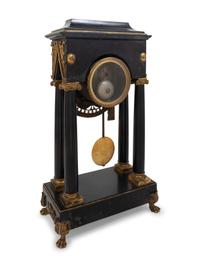 An Empire Style Gilt Metal Mounted Portico Clock
