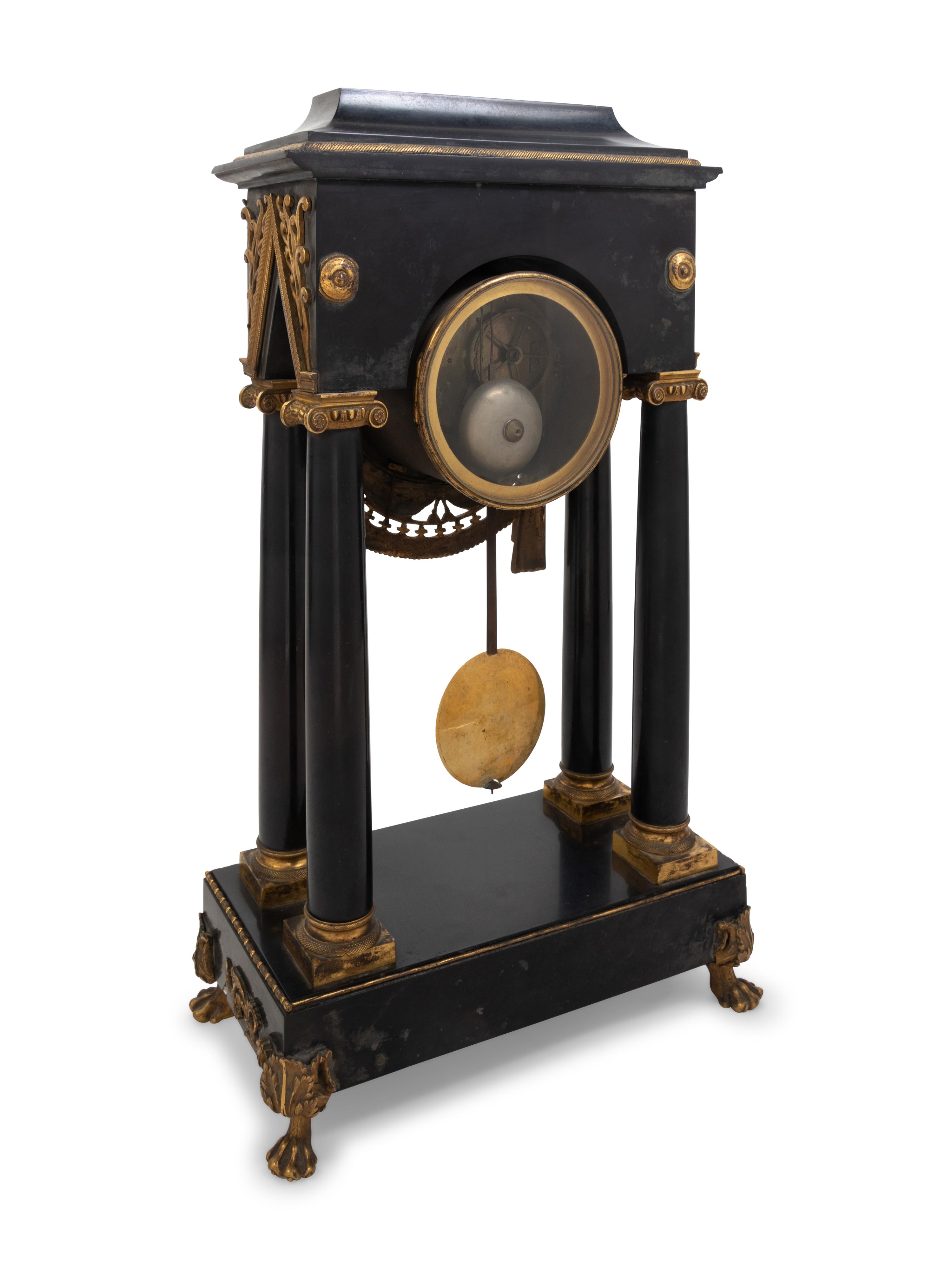 An Empire Style Gilt Metal Mounted Portico Clock