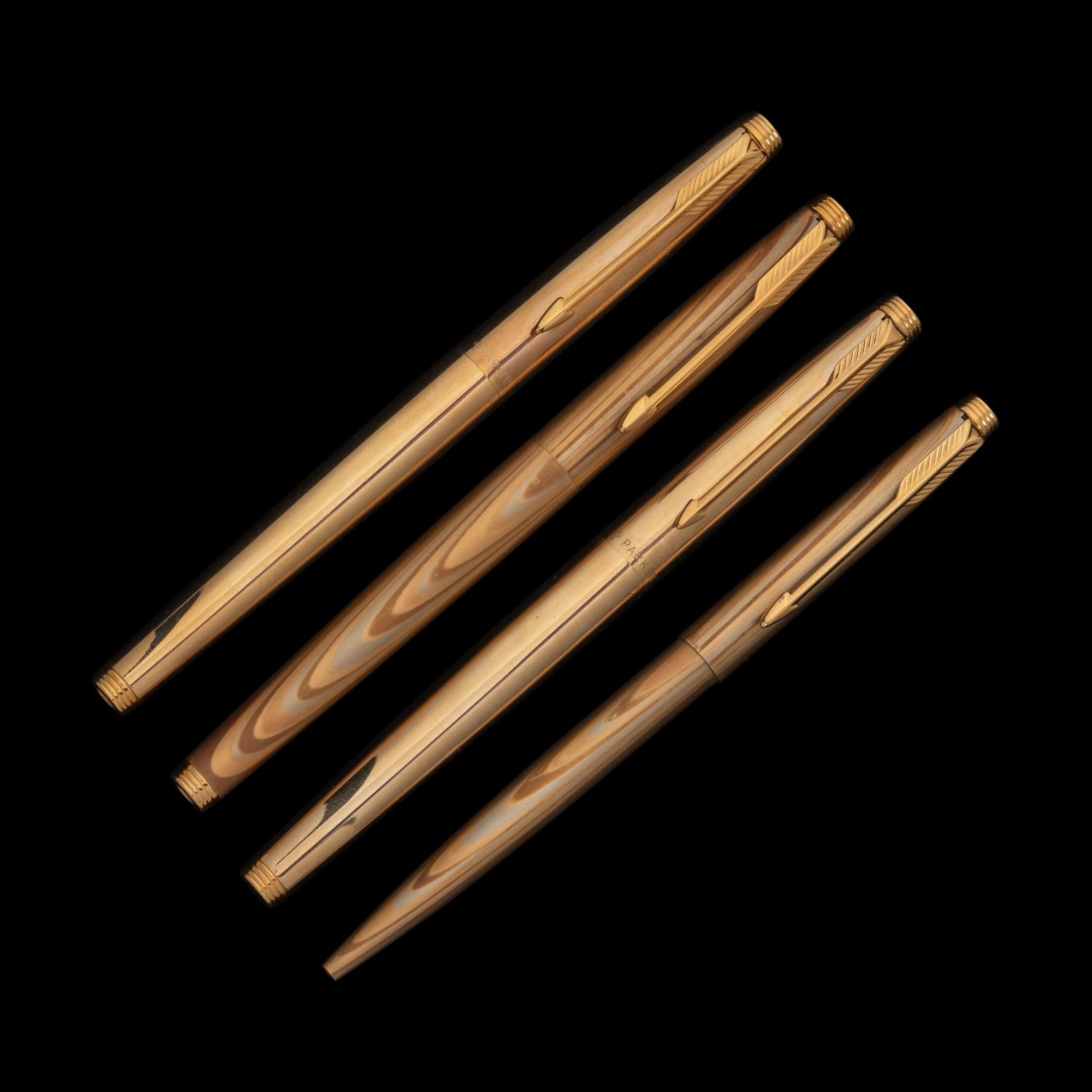 A Group of Gold Parker Writing Instruments