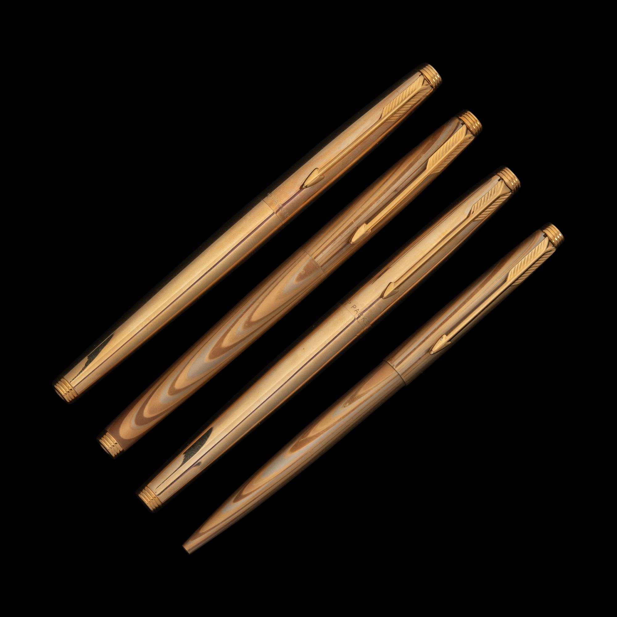 A Group of Gold Parker Writing Instruments
