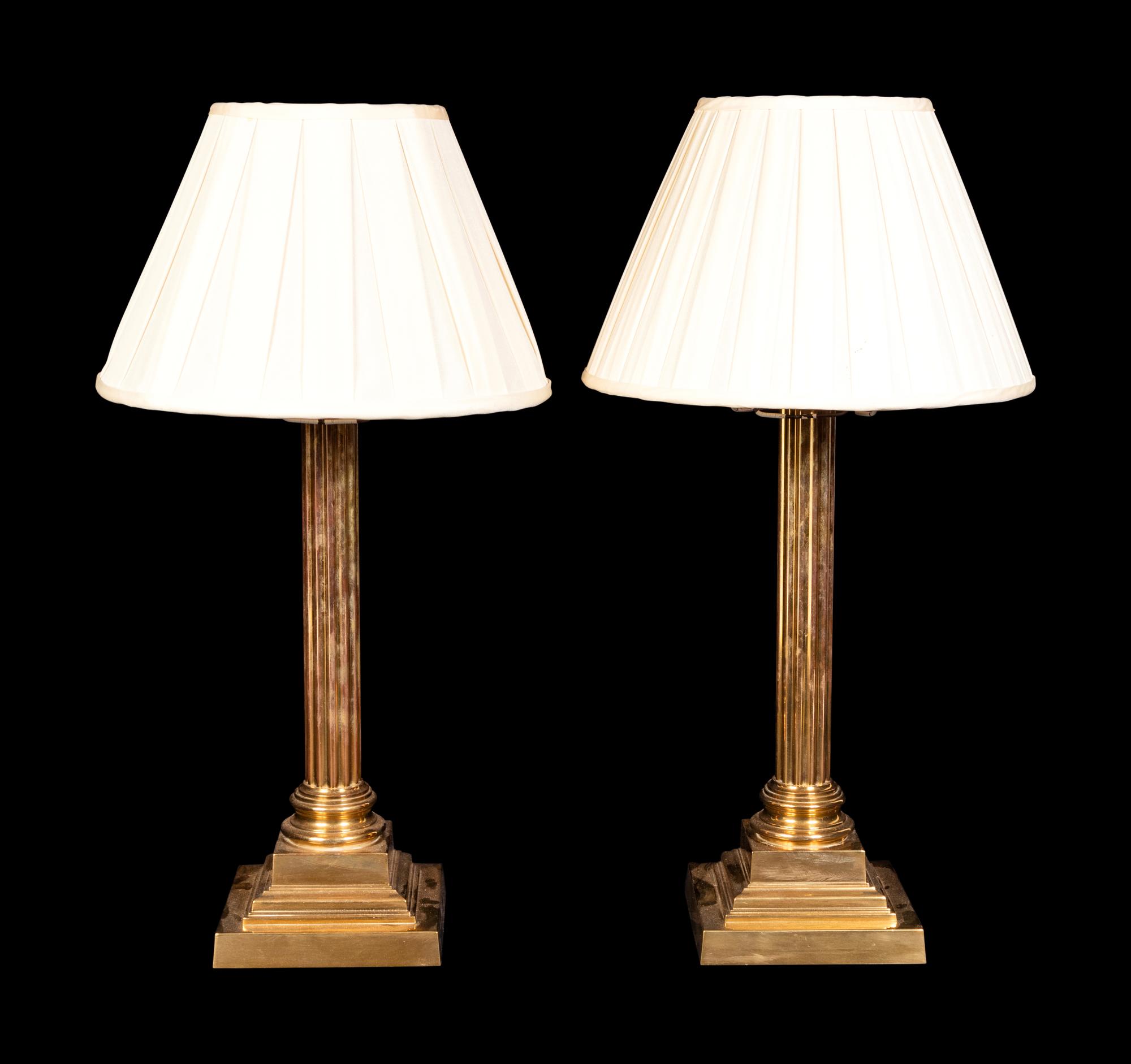 A Pair of Brass Corinthian Column Lamps
