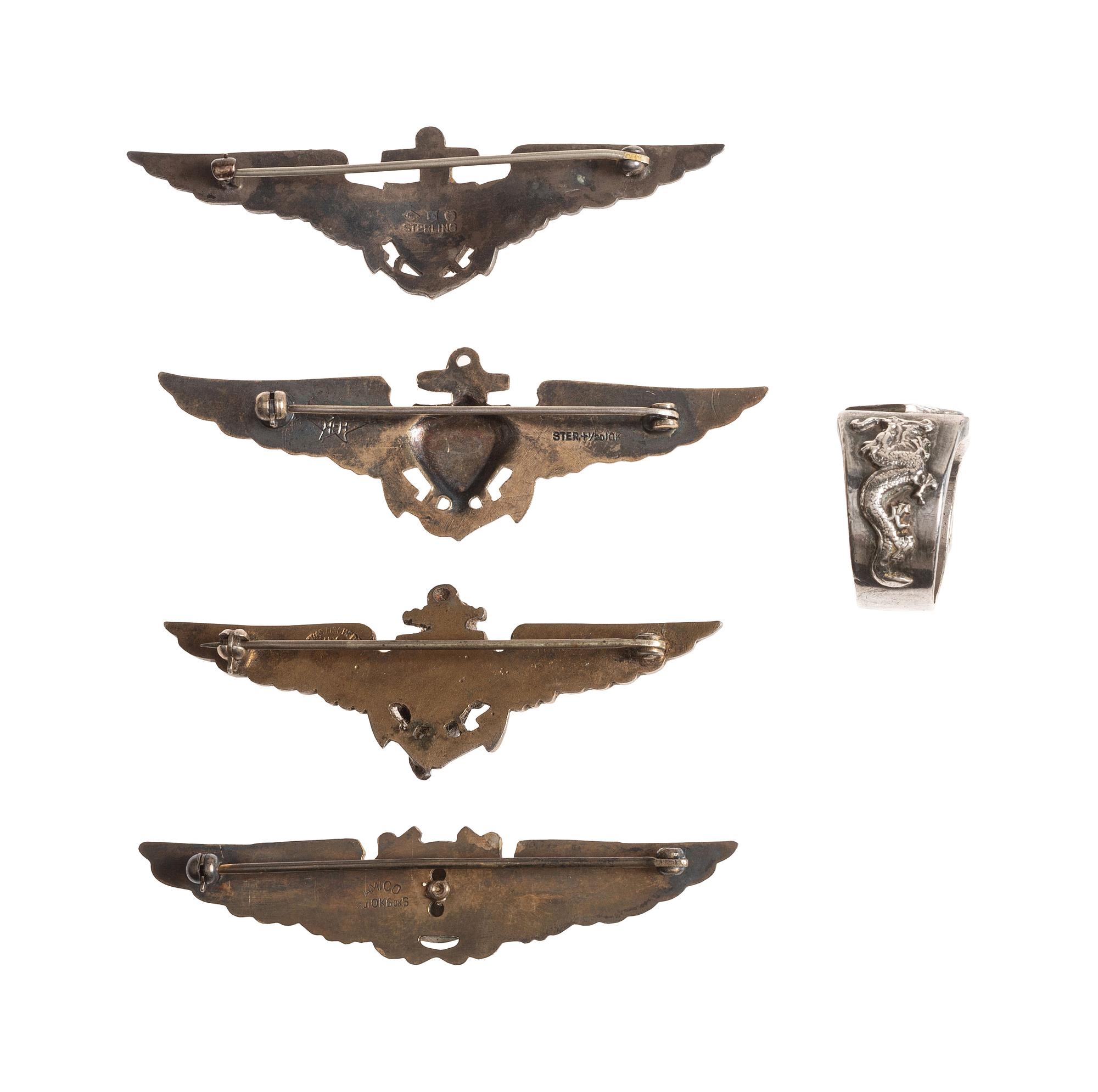 [WORLD WAR II]. A group of 5 items, incl. naval pilots' wings and dragon ring.