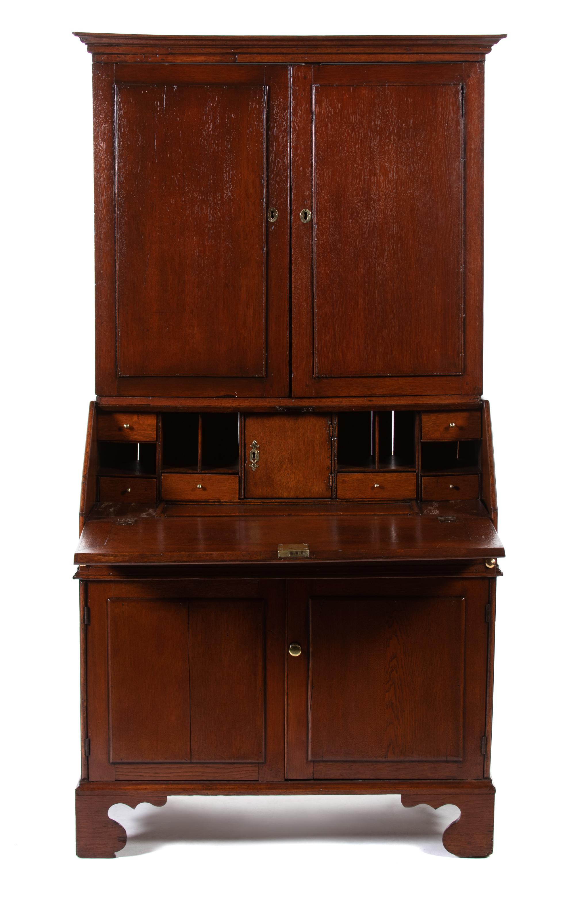 A George III Provincial Style Oak Secretary Bookcase