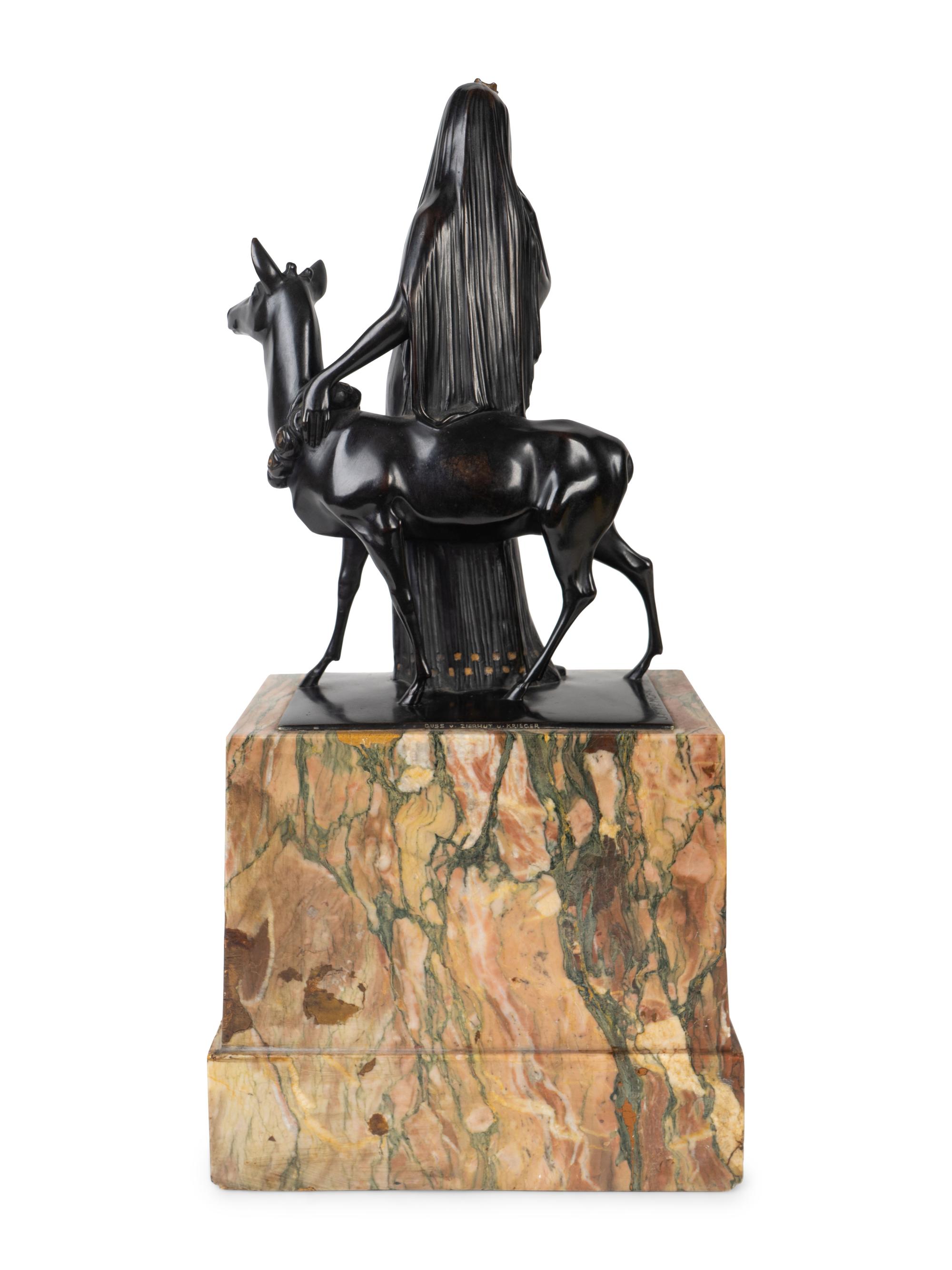 A Figural Group on a Marble Base