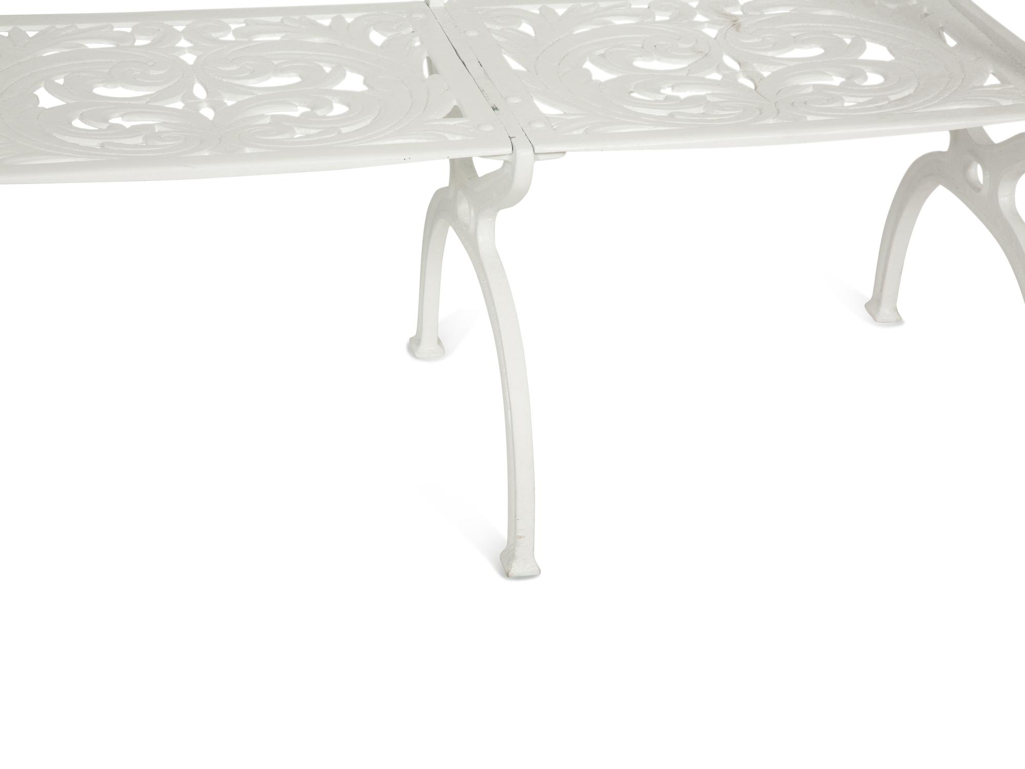 A Suite of White-Painted Cast Metal Garden Furniture