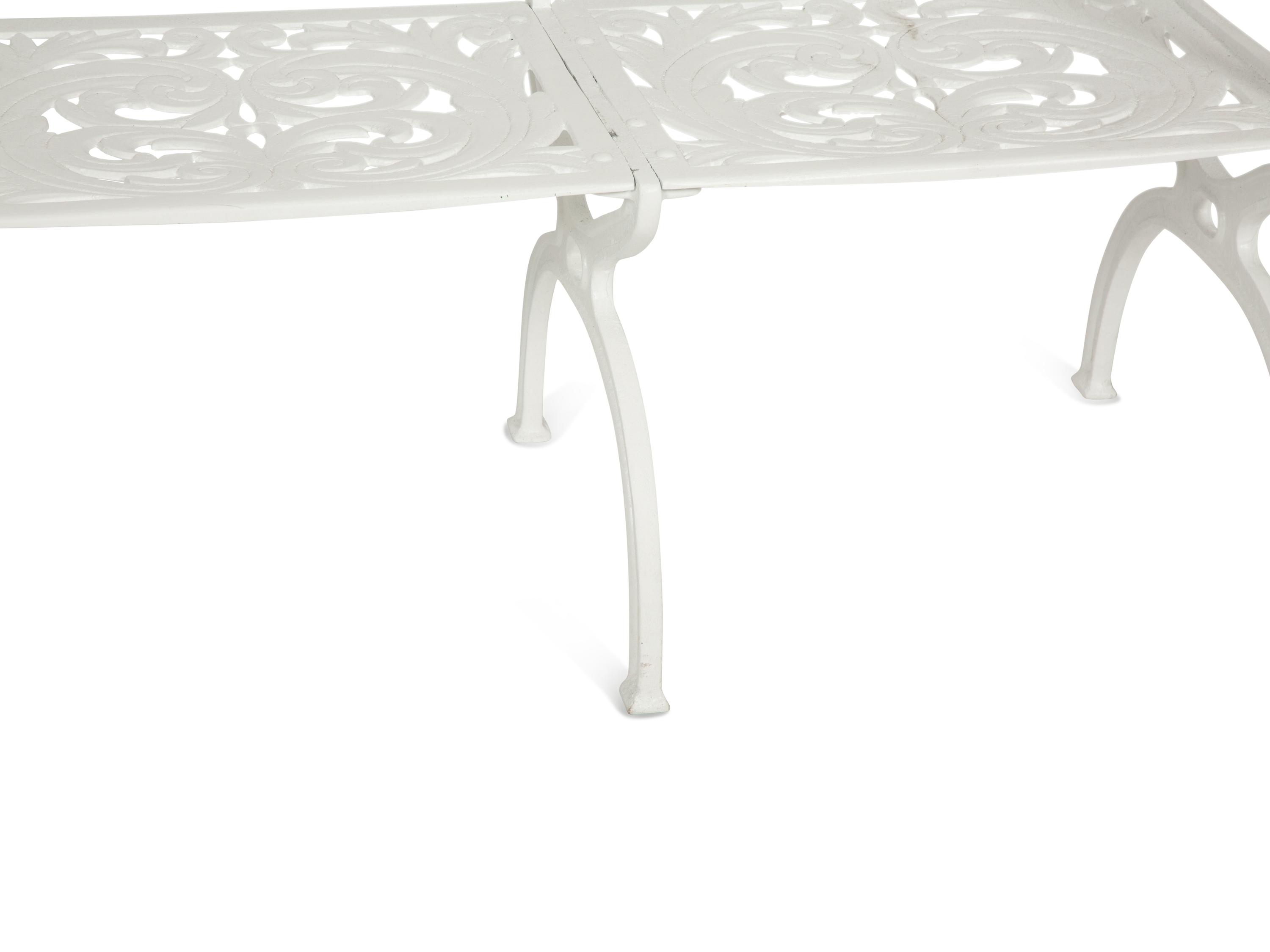 A Suite of White-Painted Cast Metal Garden Furniture
