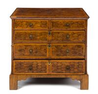 A George II Style Oysterwood Veneered Chest of Drawers Height 34 1/2 x width 38 1/2 x depth 23 inches. — 19TH CENTURY
