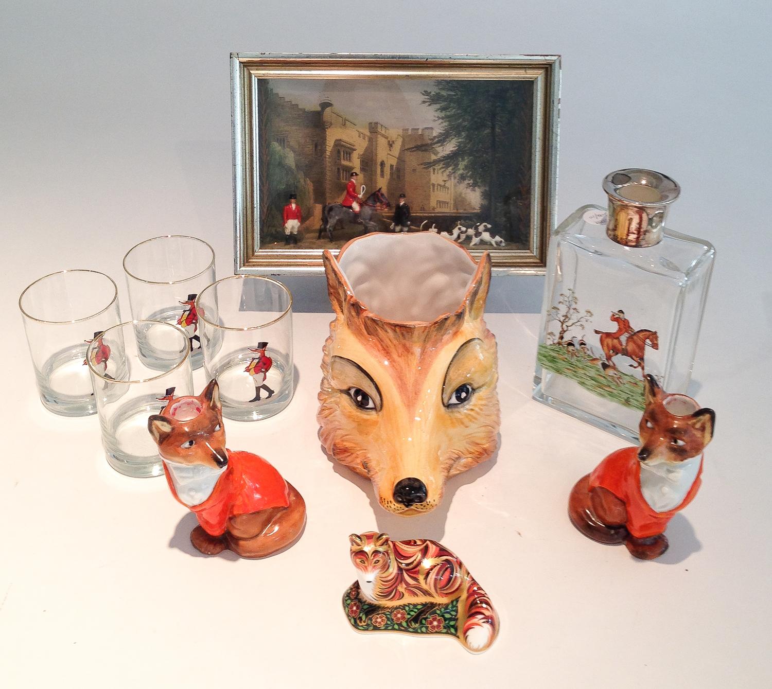 Nine Articles Associated with Foxes Height of vase 10 inches.