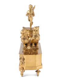 A French Ormolu Mantle Clock in the Form of a Chariot with Apollo and Lions