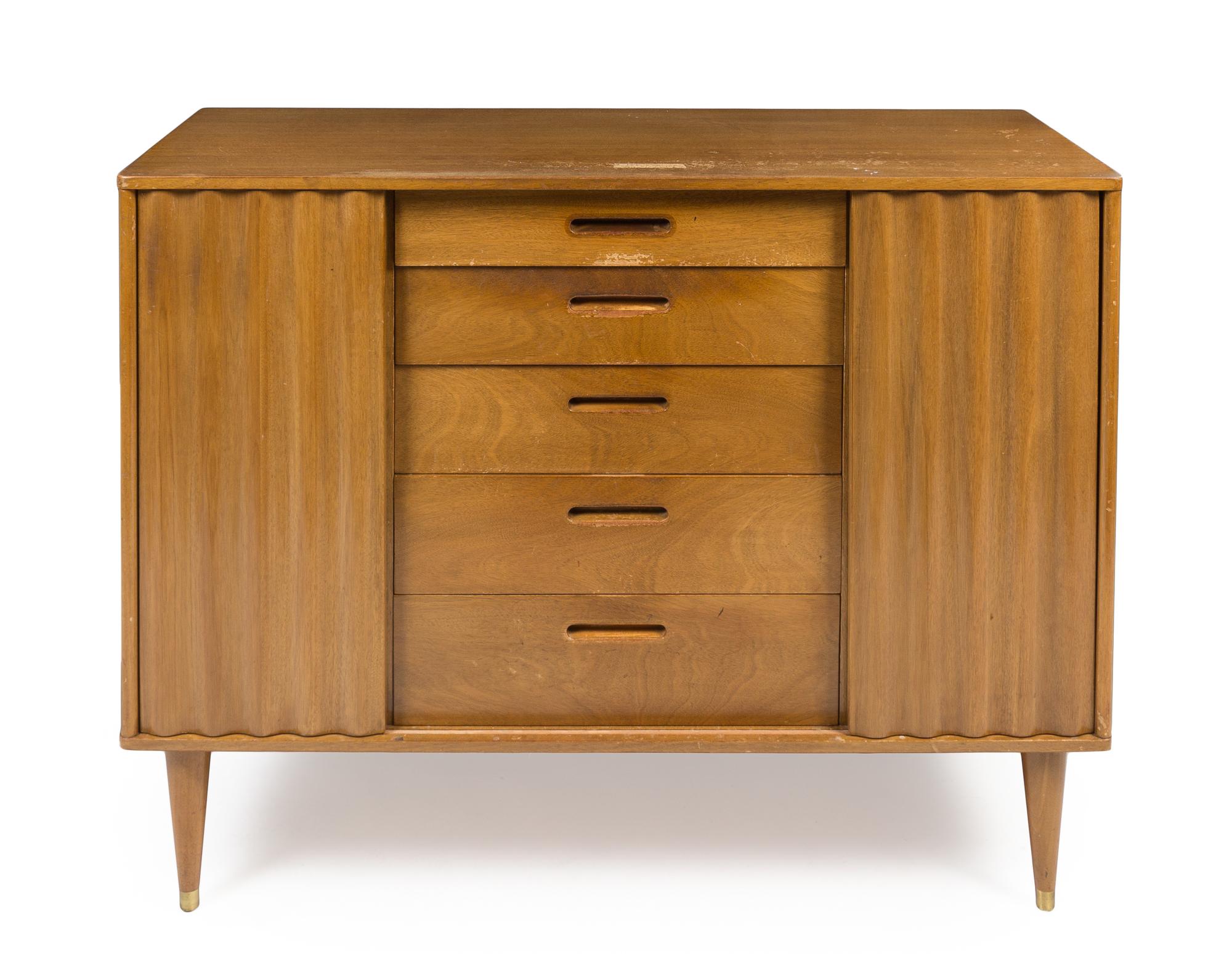 An Edward Wormley Mahogany Chest of Drawers Height 37 1/2 x width 49 x depth 20 inches.