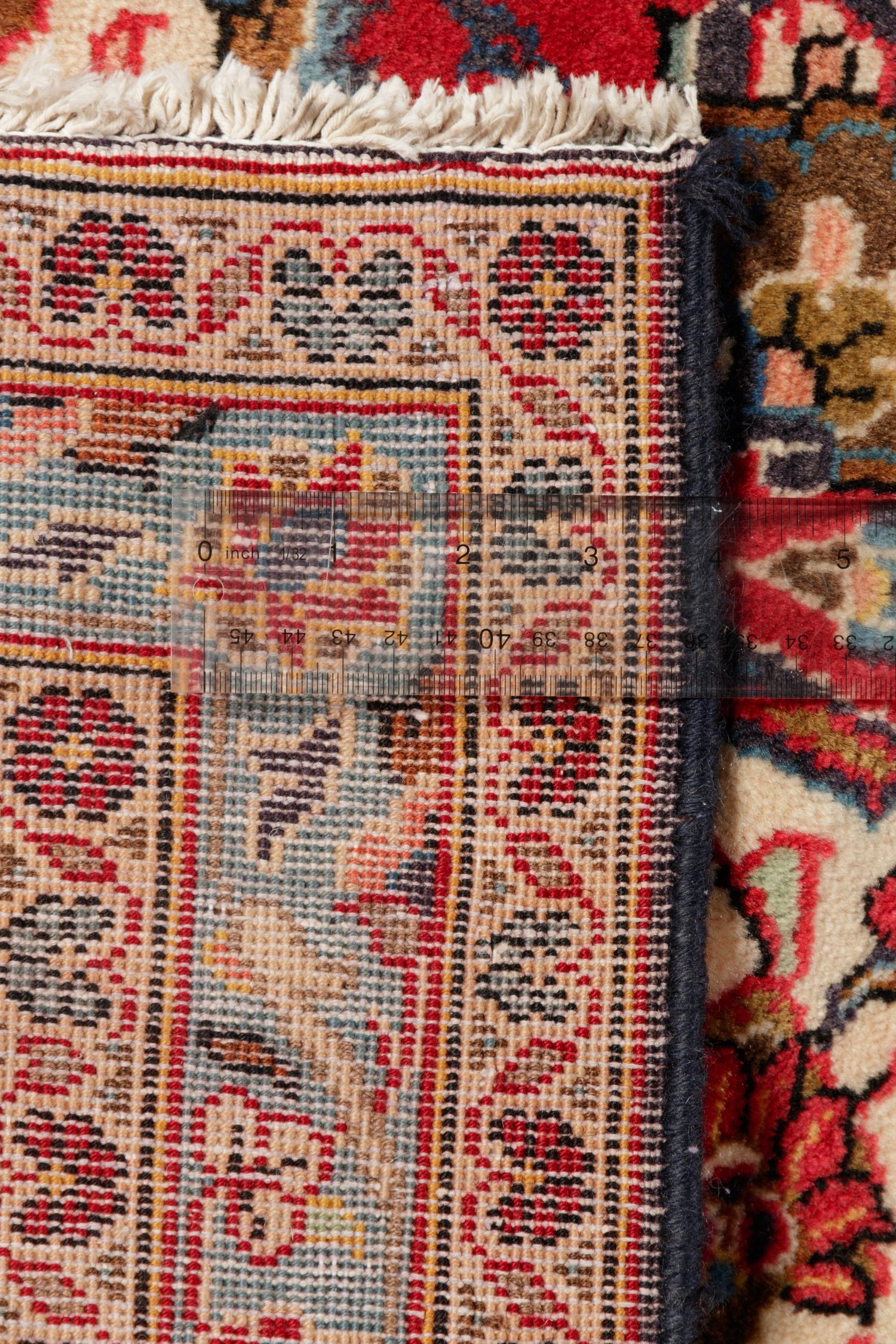 A Kashan Wool Rug