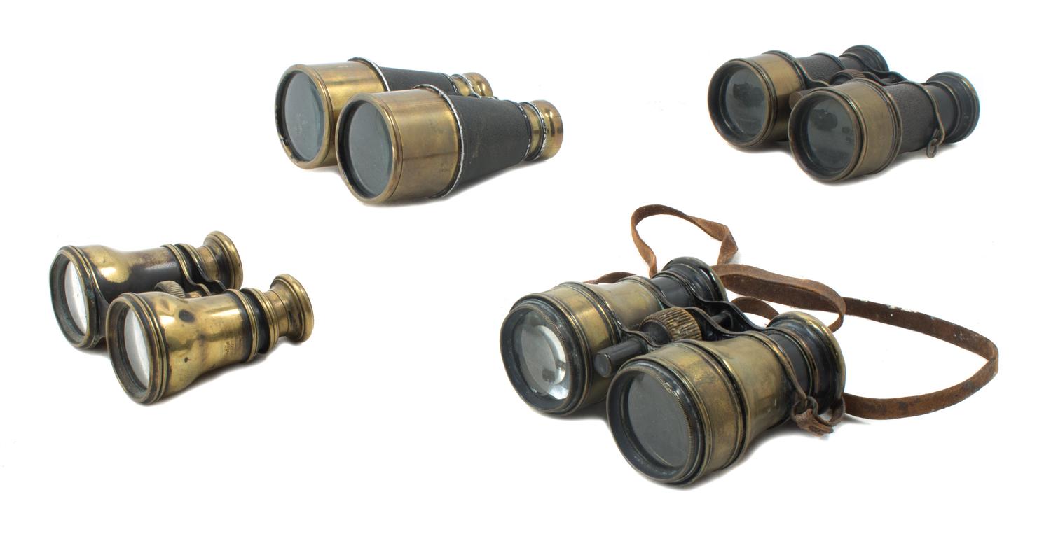 A Group of Four Brass Binoculars Width of widest 4 3/4 inches.
