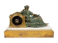 A French Empire Bronze, Gilt Bronze and Marble Figural Mantle Clock — 19TH CENTURY