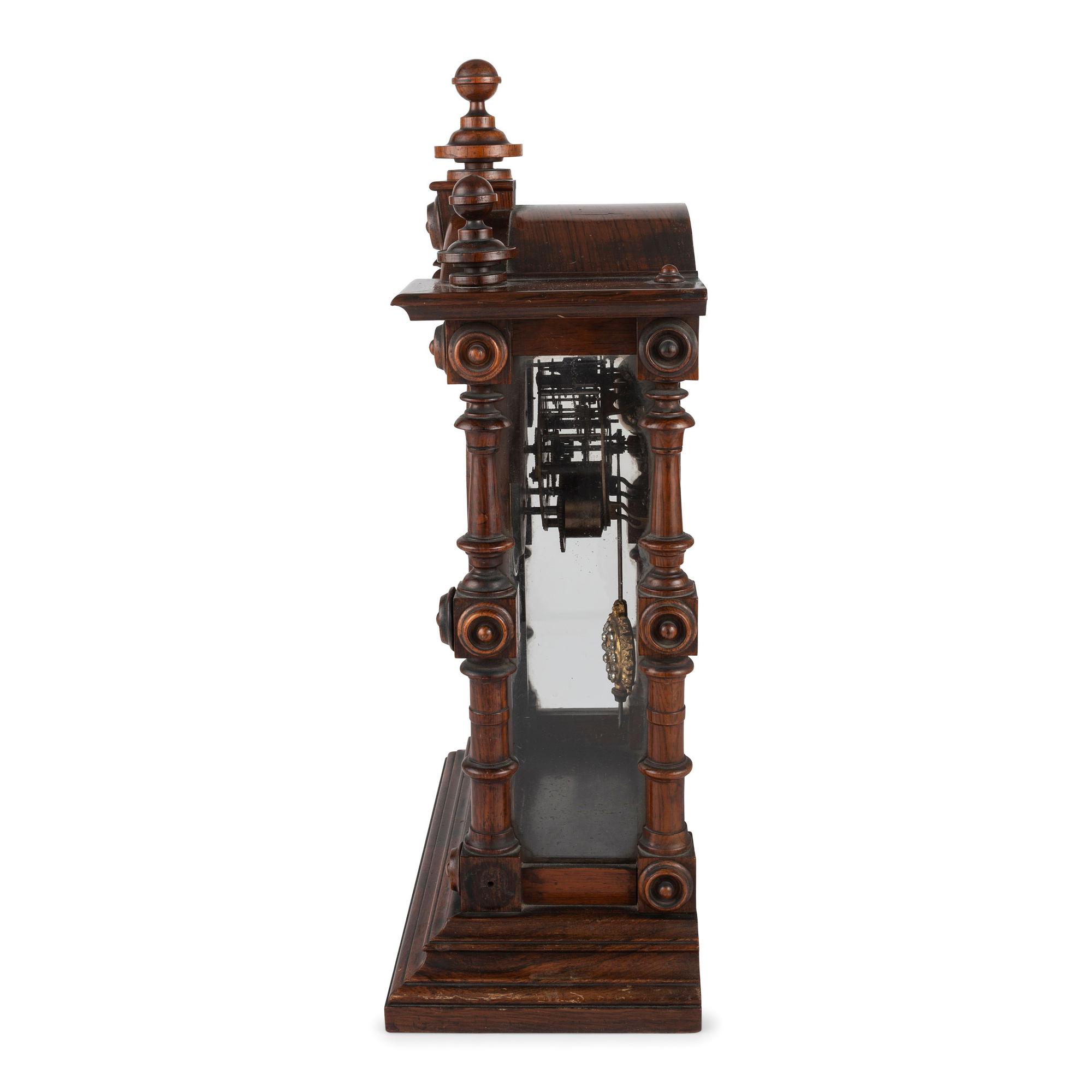 A Carved Rosewood Welch 'Patti VP' Shelf Clock
