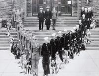 Nine Photographs of Military and Police Dogs, Various Breeds Largest: 10 1/2 x 16 1/2 inches.