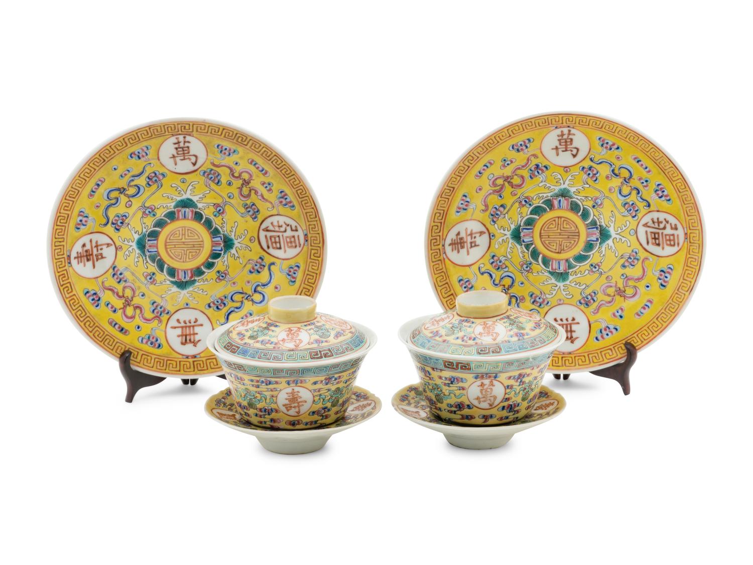 A Set of Four Chinese Famille Jaune Porcelain Tea Services