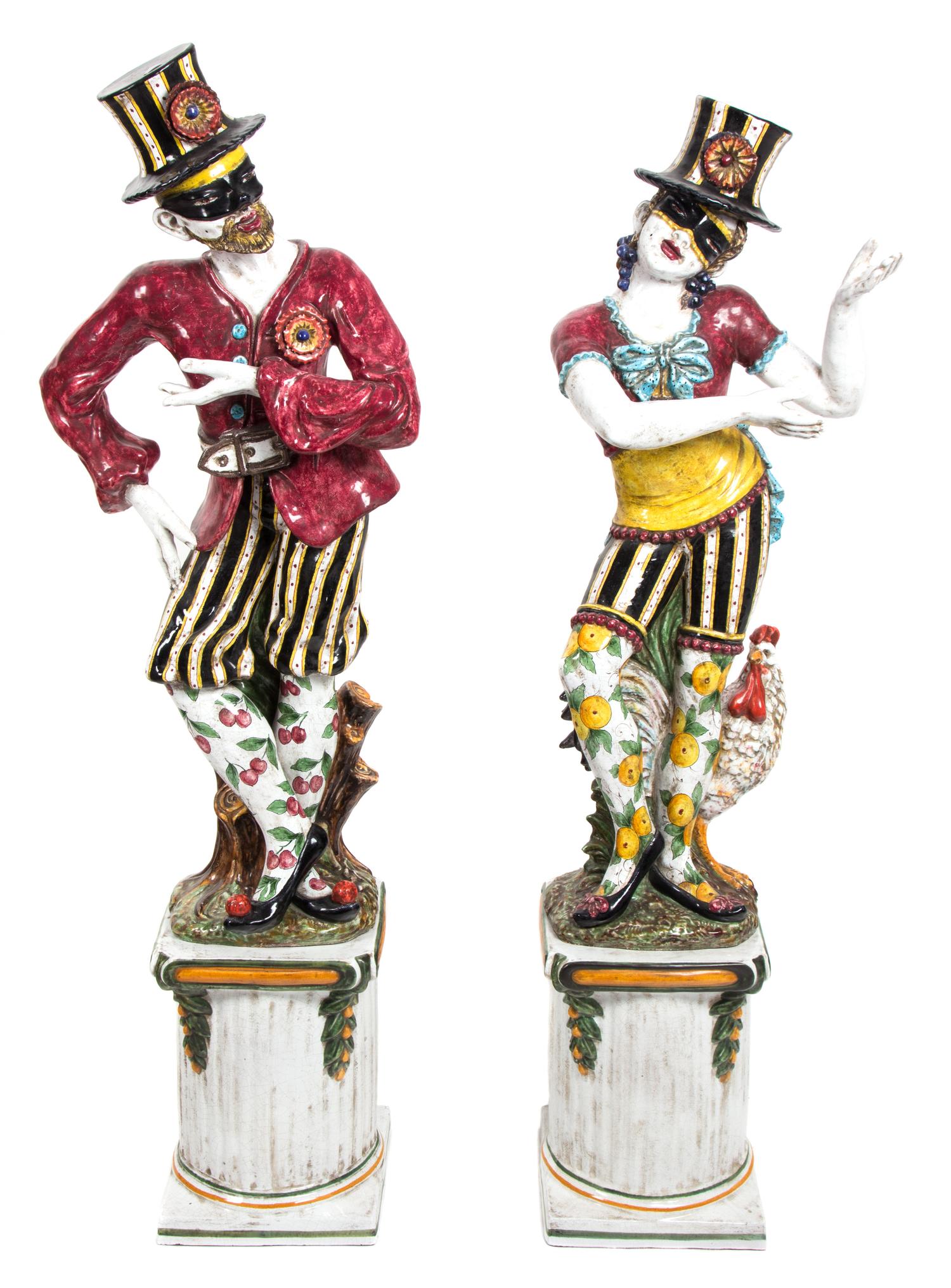 A Pair of Italian Glazed Ceramic Figures Height of taller 57 1/2 inches. — 20TH CENTURY