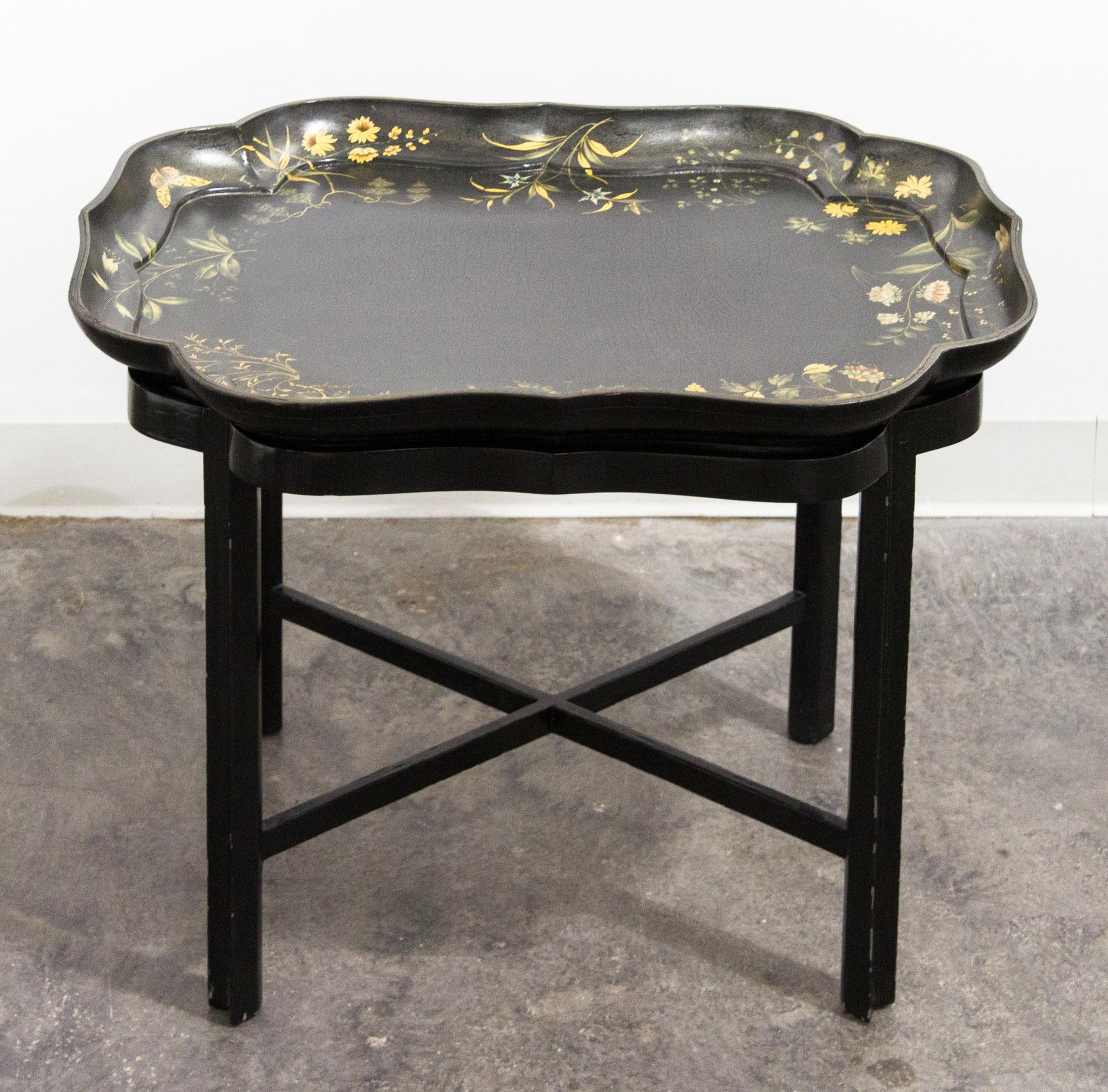A Victorian Lacquered Wood Tray Height overall 21 1/2 x width 28 3/4 x depth 22 inches.