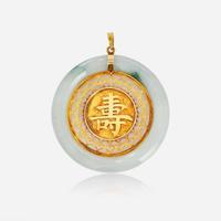 A 14K Yellow Gold and Jade Pendant