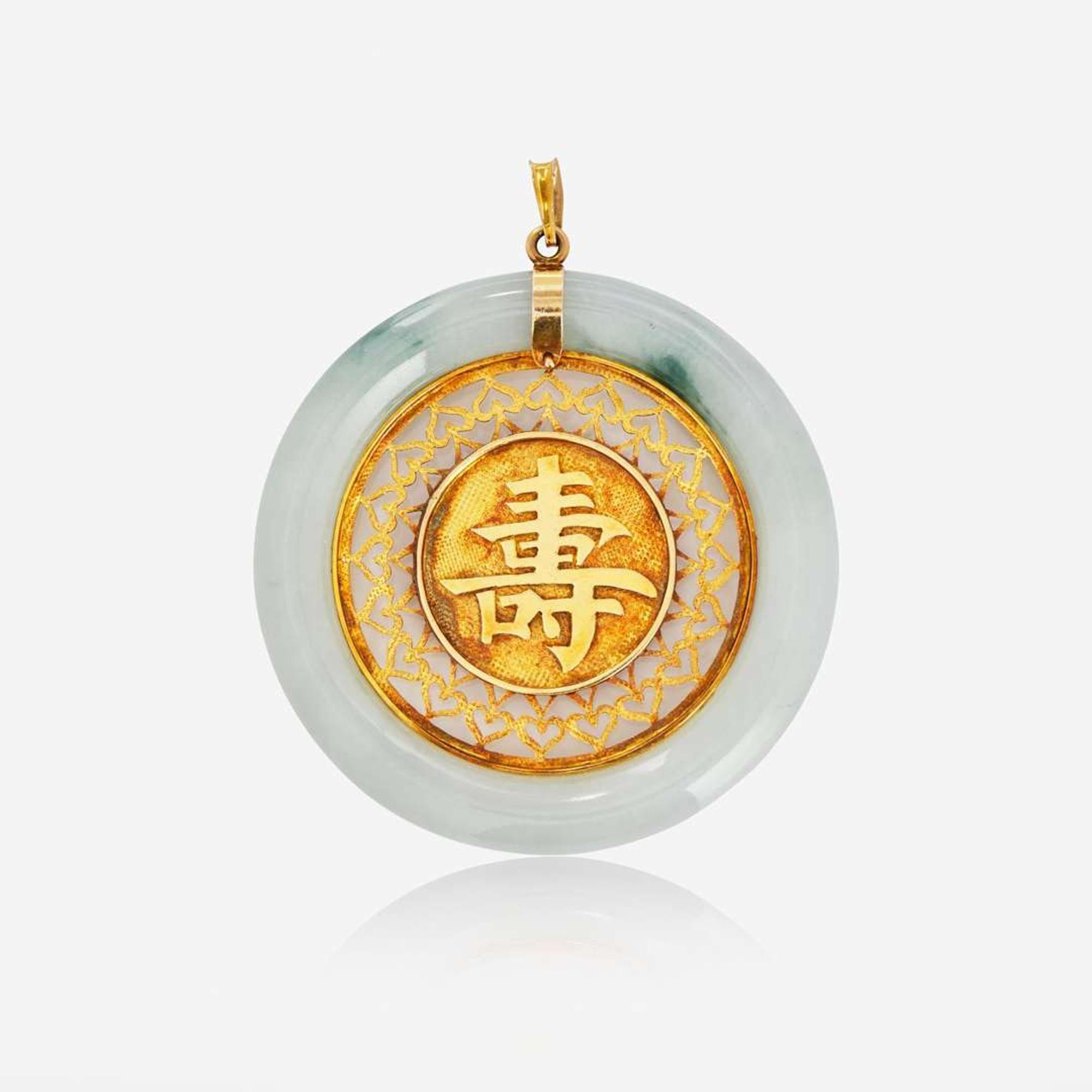 A 14K Yellow Gold and Jade Pendant