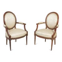 A Pair of Louis XVI Walnut Fauteuils en Cabriolet