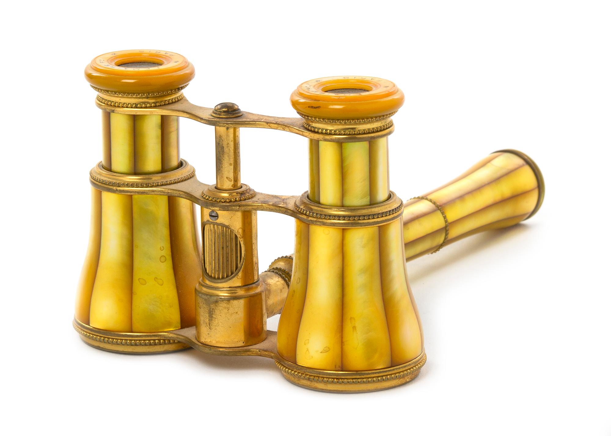A Pair of French Mother-of-Pearl Veneered Opera Glasses, Lemaire, Width 3 7/8 inches.