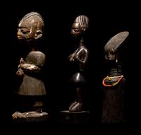 Three Dan Passport Masks, An Ashanti Wood Idol, and Two Wood Figures