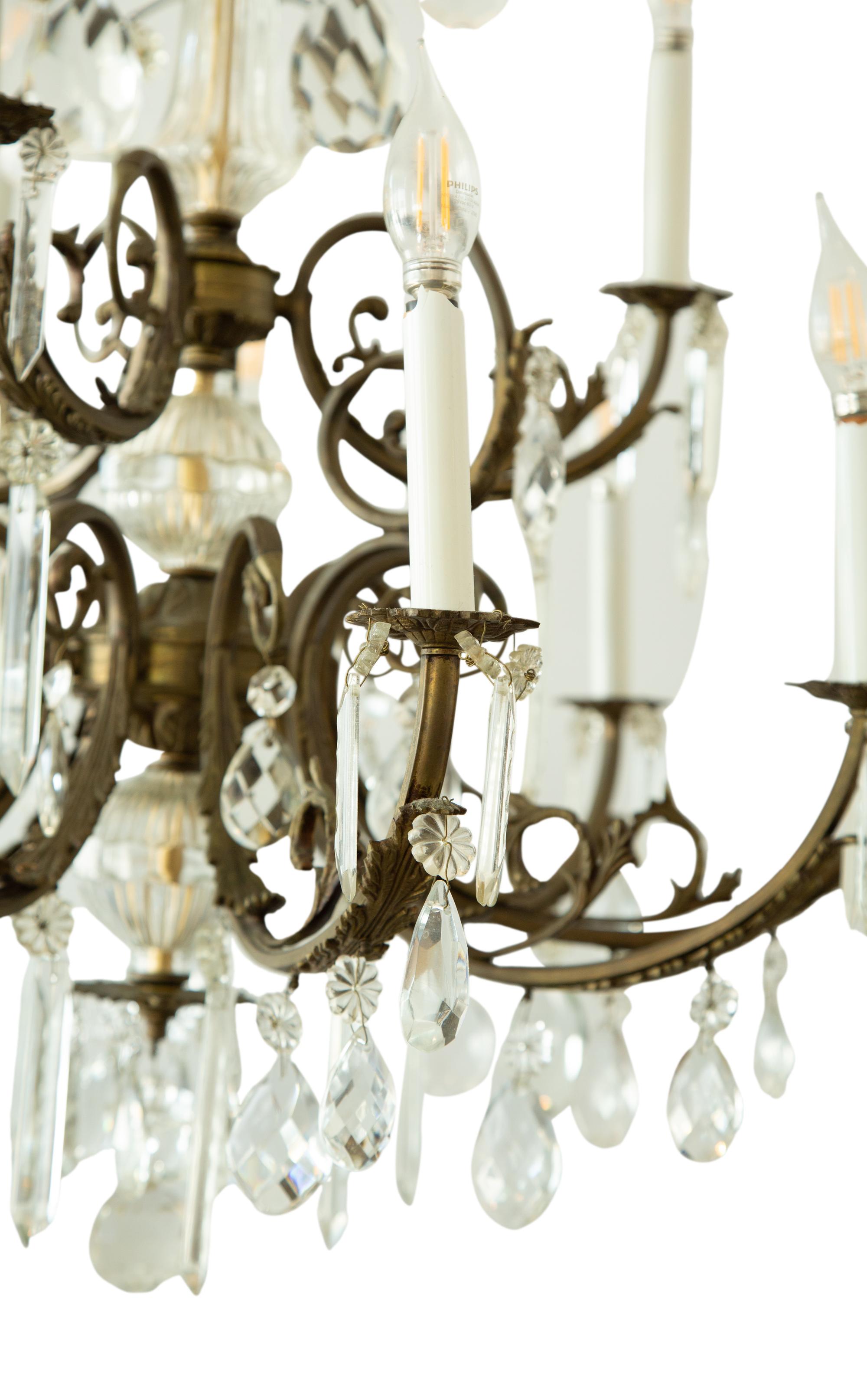 A Continental Gilt Bronze and Glass Twelve-Light Two-Tier Chandelier