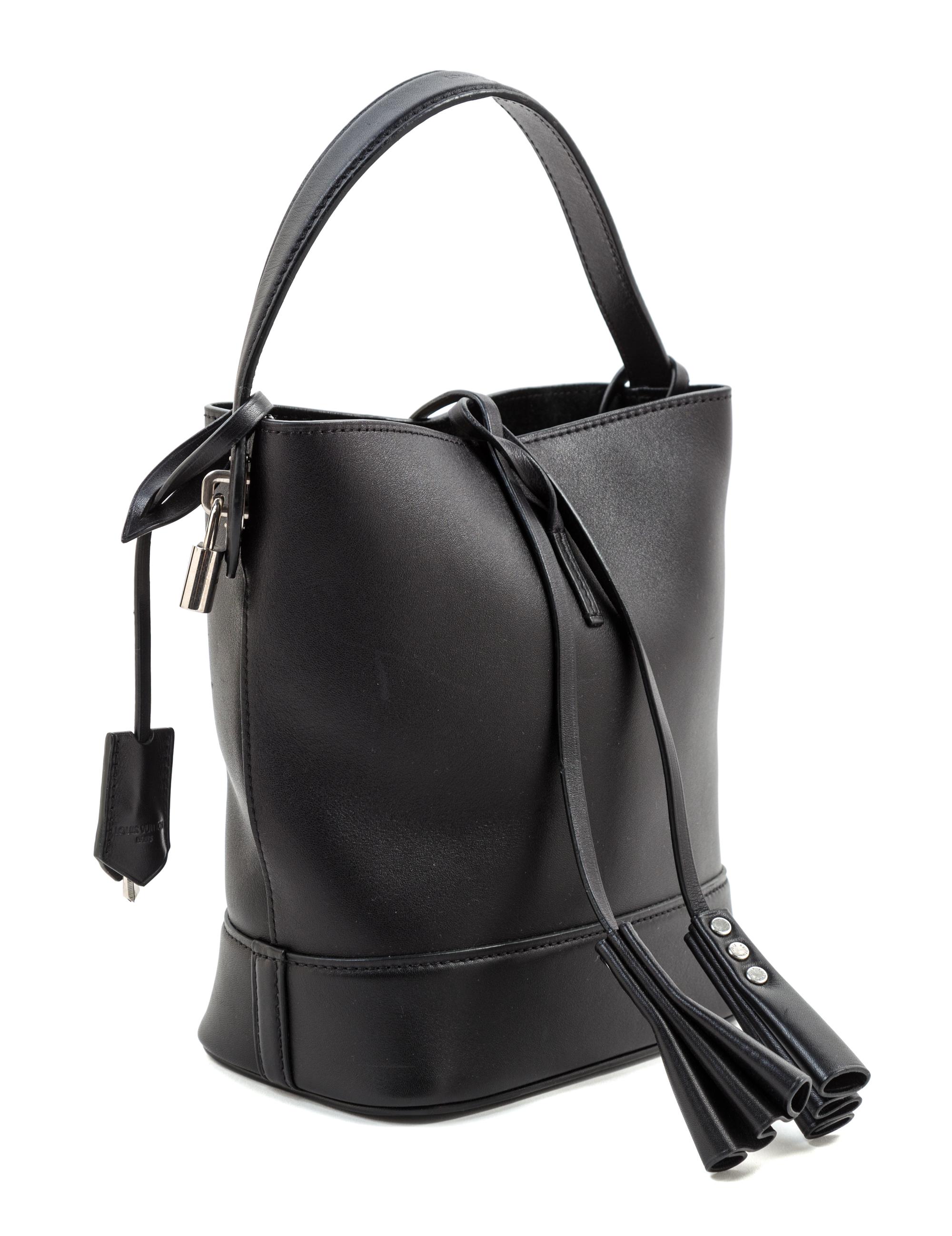 A Louis Vuitton Black Leather Cuir Nuance Tote, 7" x 9" x 4.25"; Handle drop: 4.5".