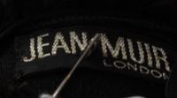 A Jean Muir Black Sheer Feather Trimmed Coat,