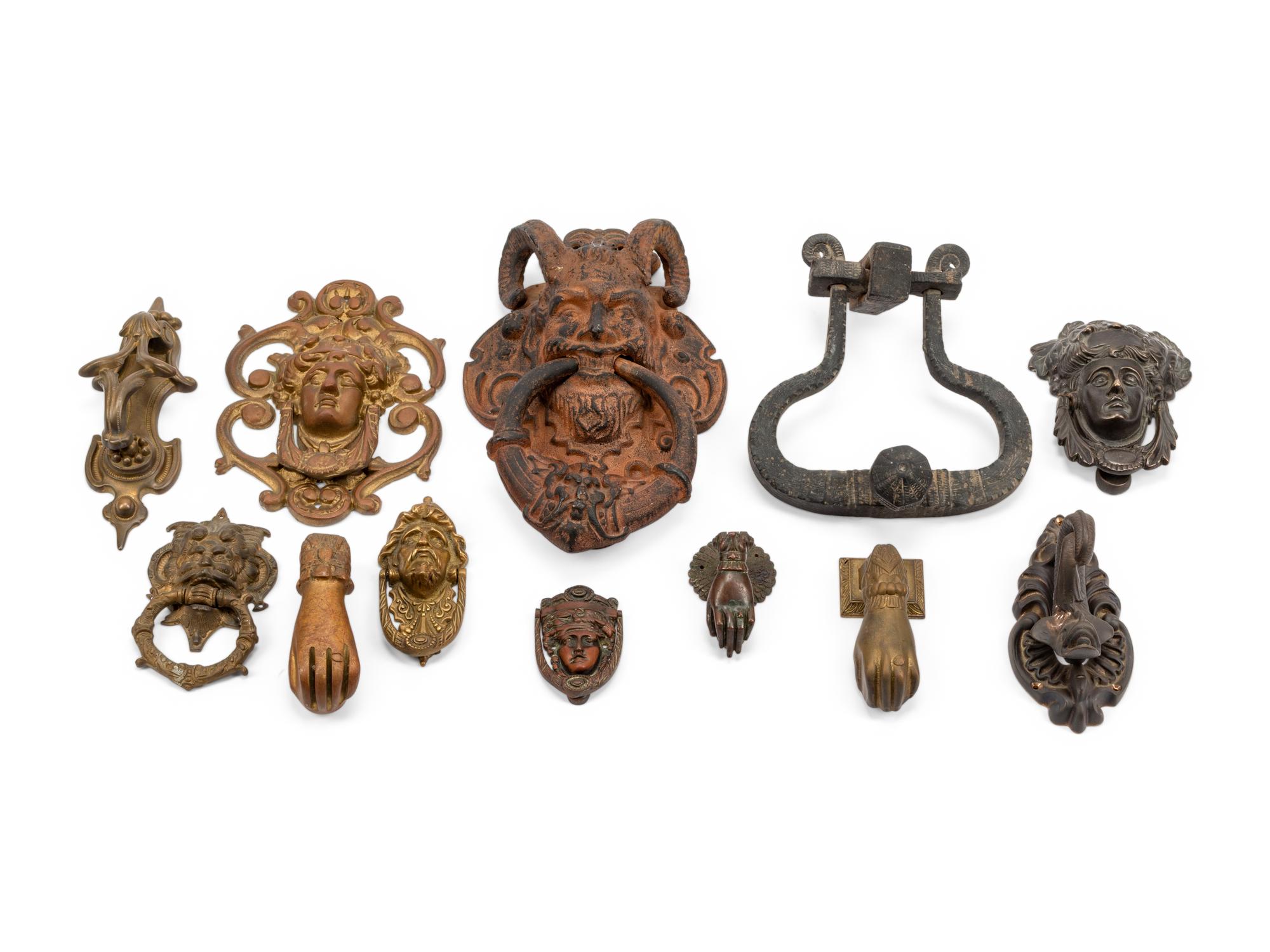 A Collection of Twelve Continental Bronze Door Knockers