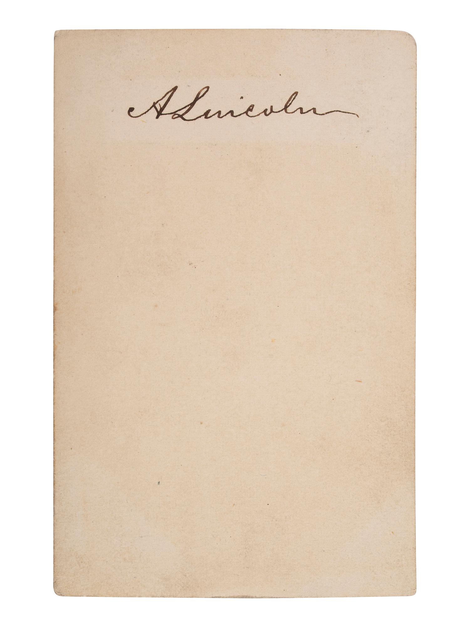 LINCOLN, Abraham (1809-1865). CDV of beardless Lincoln signed on verso "A Lincoln" with original cover addressed in Lincoln's hand, dated 10 April 1861.