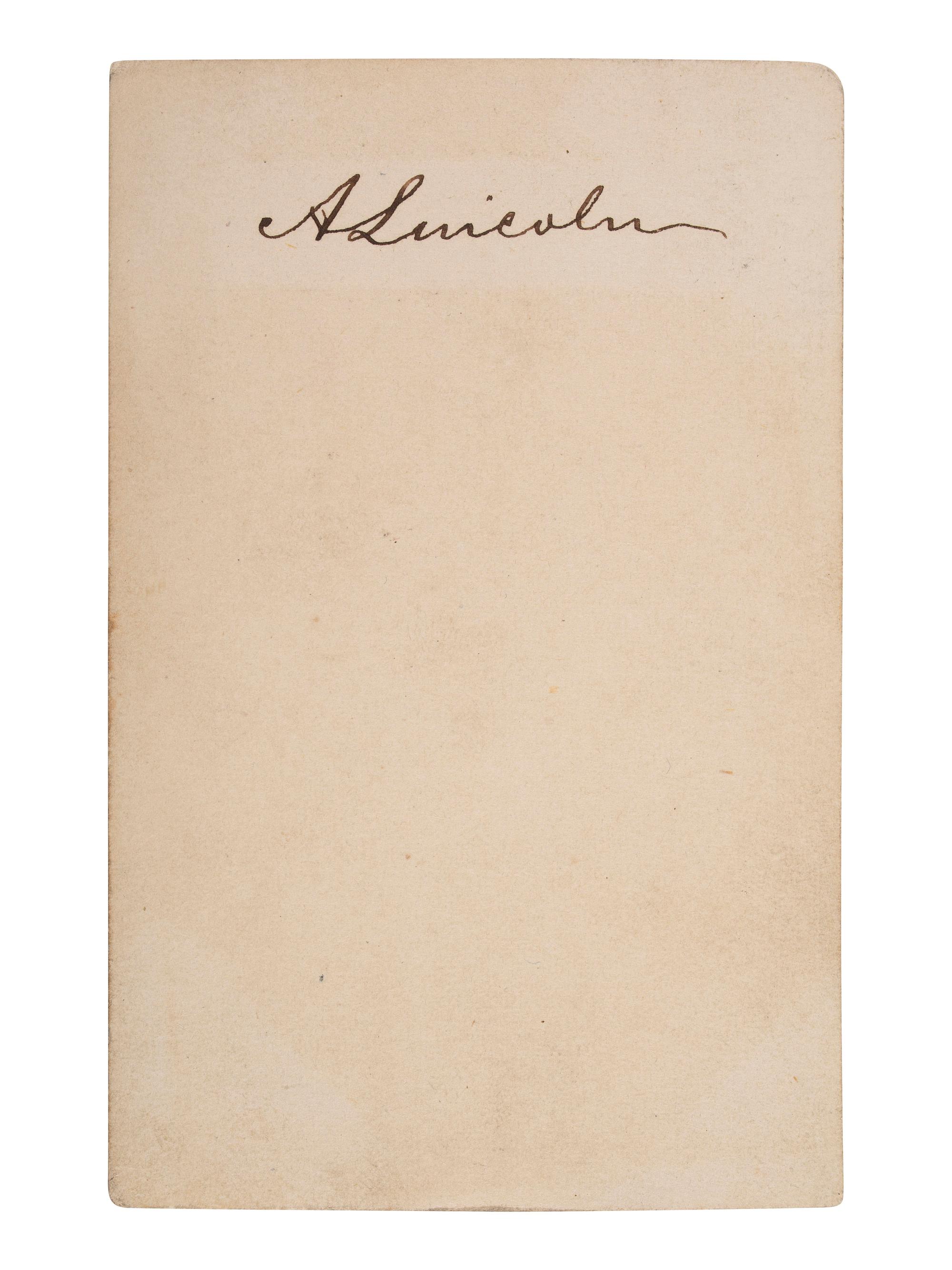 LINCOLN, Abraham (1809-1865). CDV of beardless Lincoln signed on verso "A Lincoln" with original cover addressed in Lincoln's hand, dated 10 April 1861.