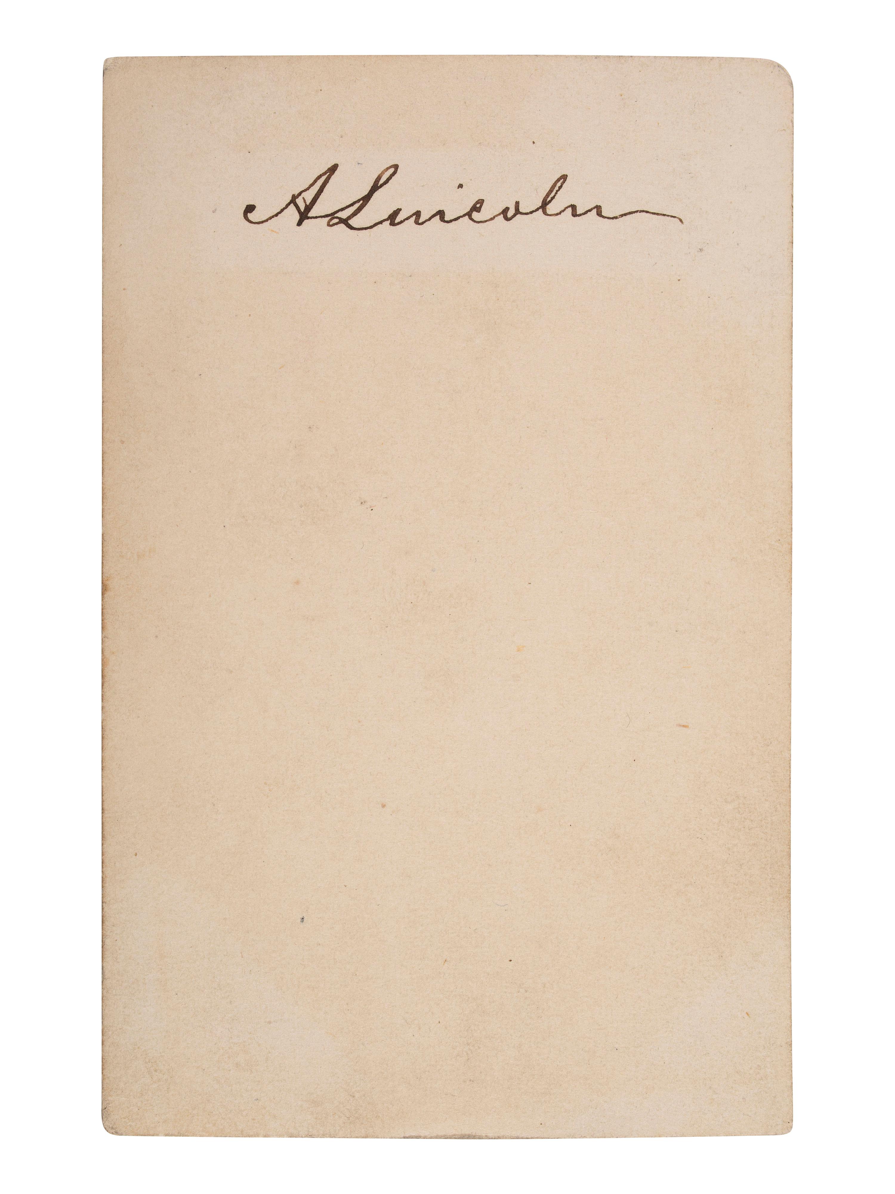 LINCOLN, Abraham (1809-1865). CDV of beardless Lincoln signed on verso "A Lincoln" with original cover addressed in Lincoln's hand, dated 10 April 1861.