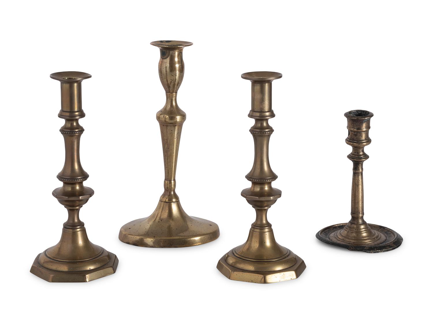 Sixteen English Brass Candlesticks