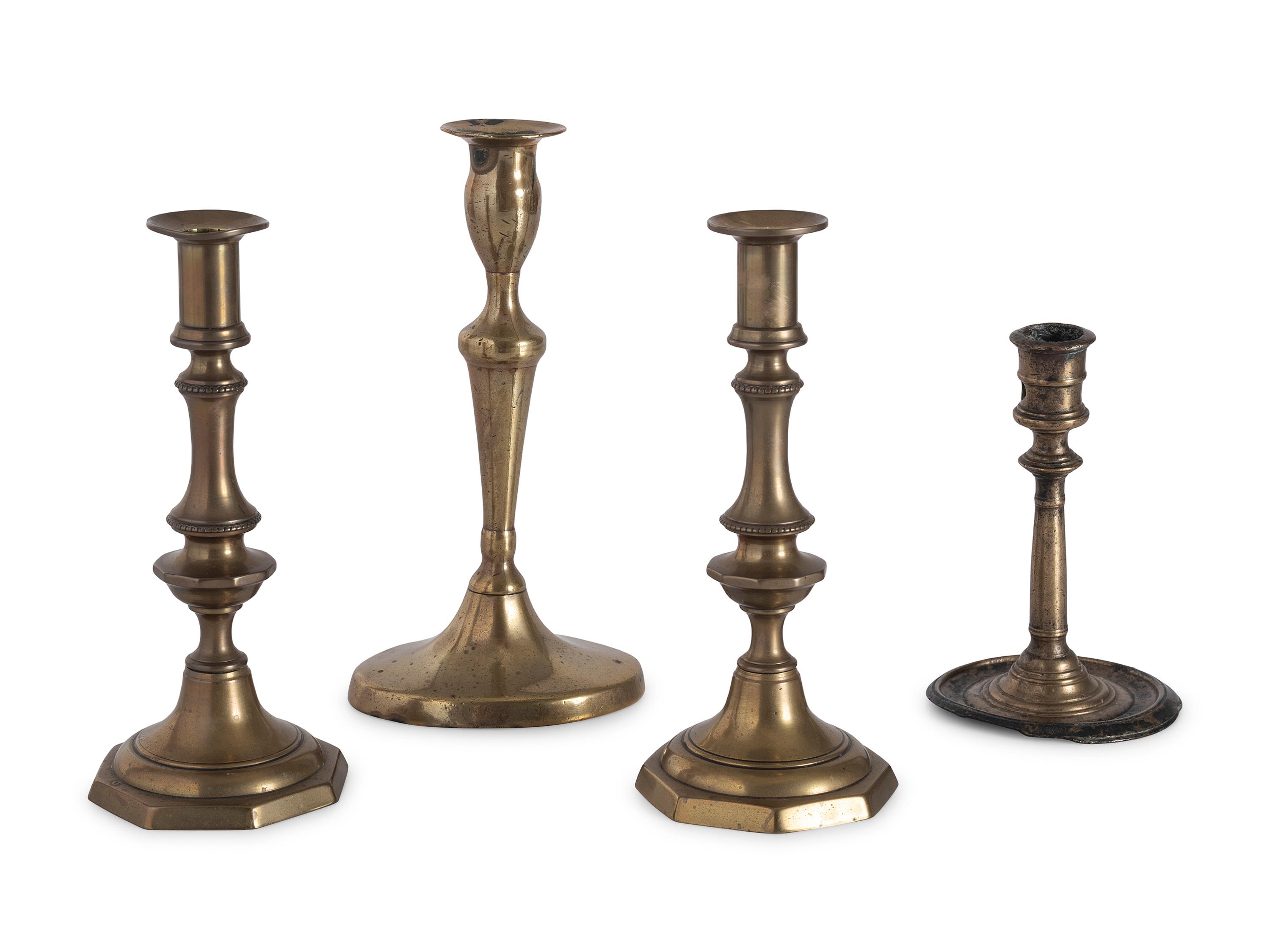Sixteen English Brass Candlesticks