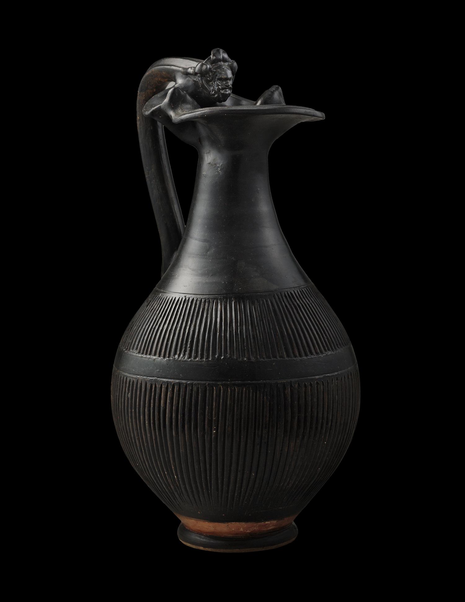 An Apulian Black-Glazed Oinochoe